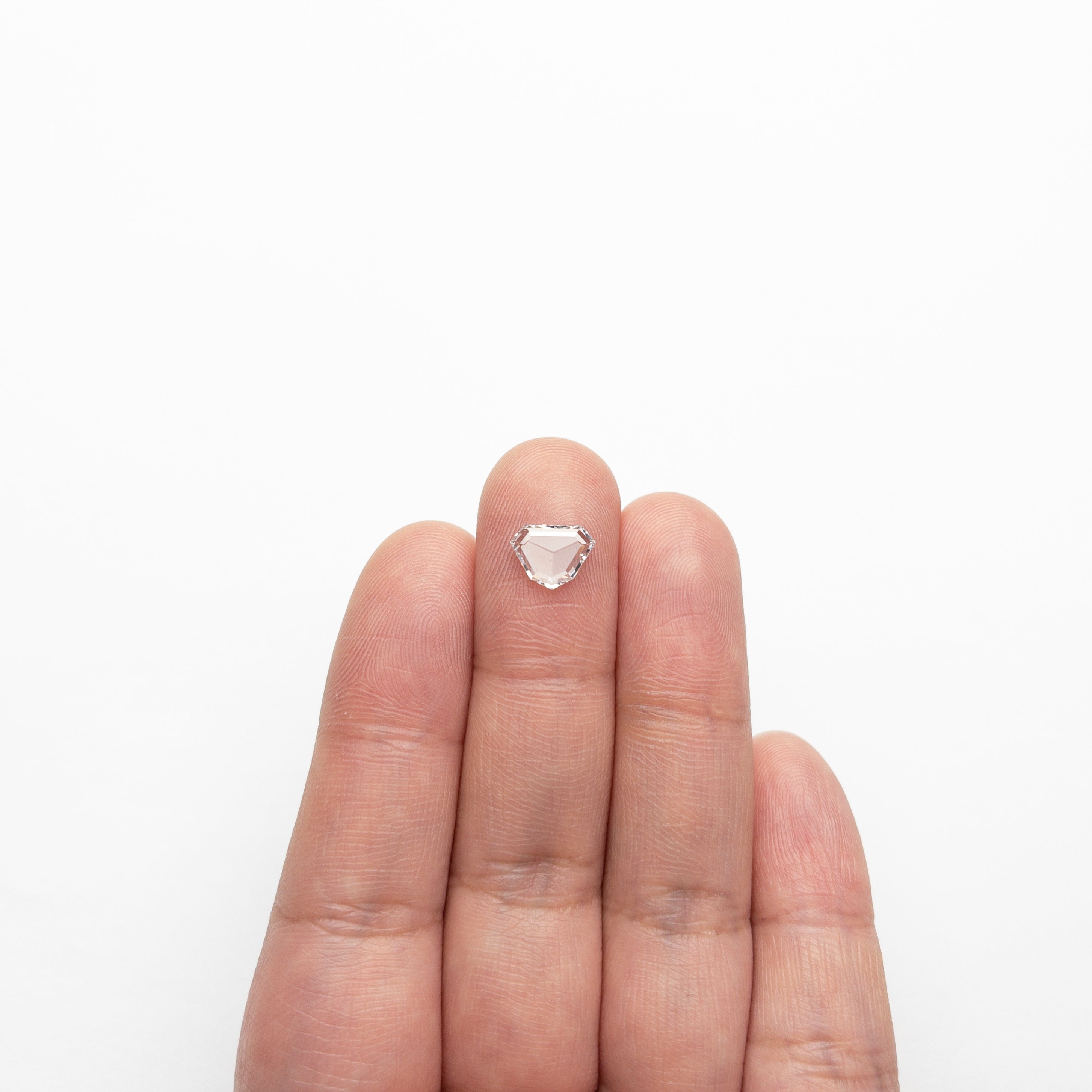 The 0.99ct 8.89x6.63x1.75mm VS1 E Shield Rosecut 20939-06 by East London jeweller Rachel Boston | Discover our collections of unique and timeless engagement rings, wedding rings, and modern fine jewellery.