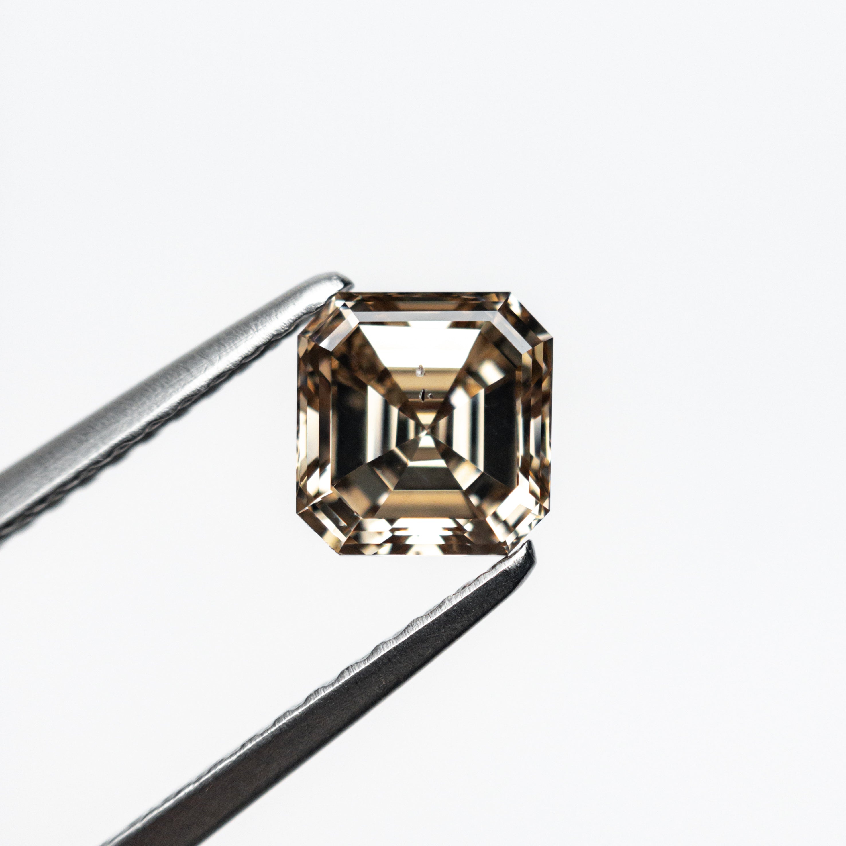 The 1.00ct 5.67x5.48x3.59mm SI2+ C5 Cut Corner Square Step Cut 🇨🇦 21088-01 by East London jeweller Rachel Boston | Discover our collections of unique and timeless engagement rings, wedding rings, and modern fine jewellery.