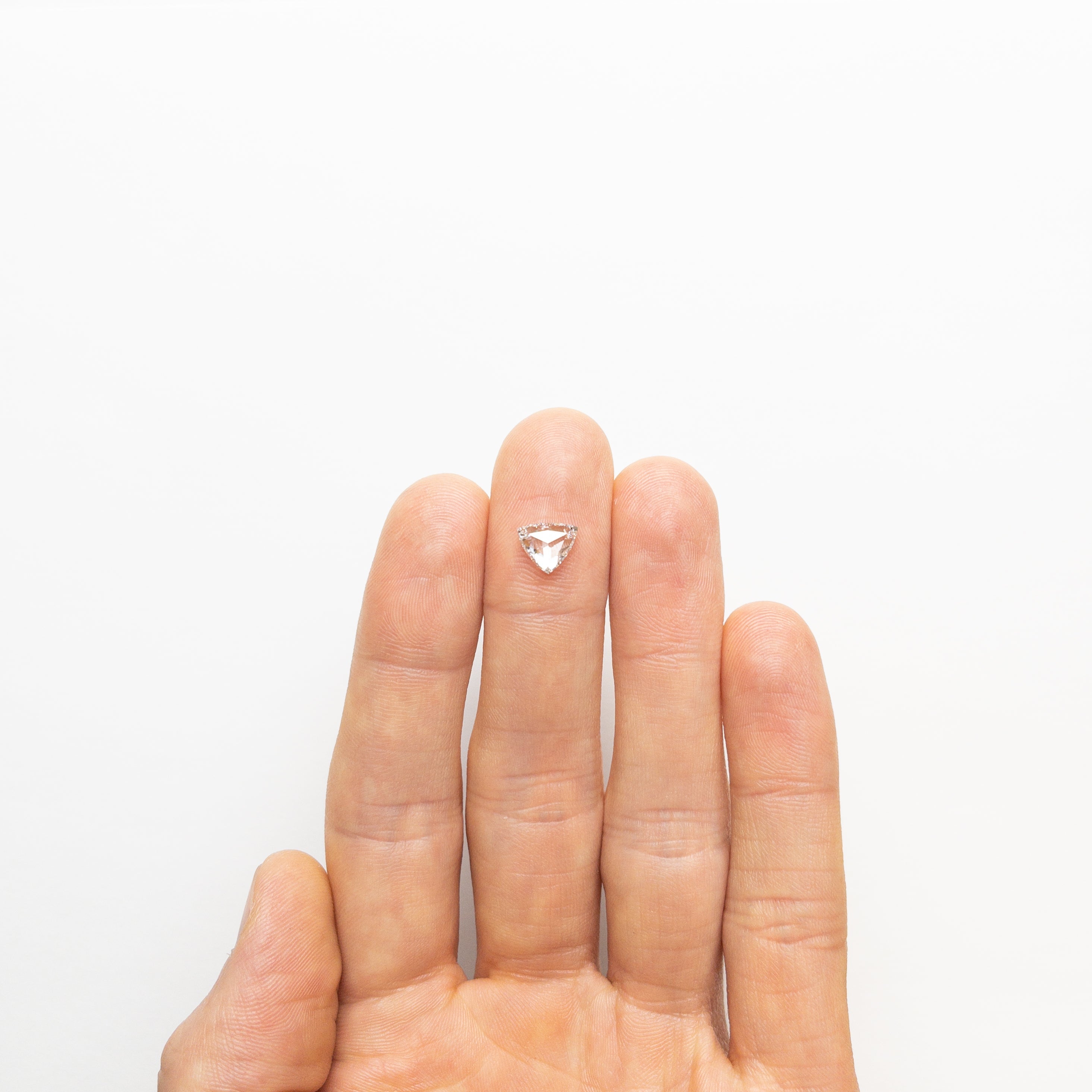 The 1.25ct 6.85x8.22x2.78mm SI2 F Trillion Rosecut 🇨🇦 21119-01 by East London jeweller Rachel Boston | Discover our collections of unique and timeless engagement rings, wedding rings, and modern fine jewellery.