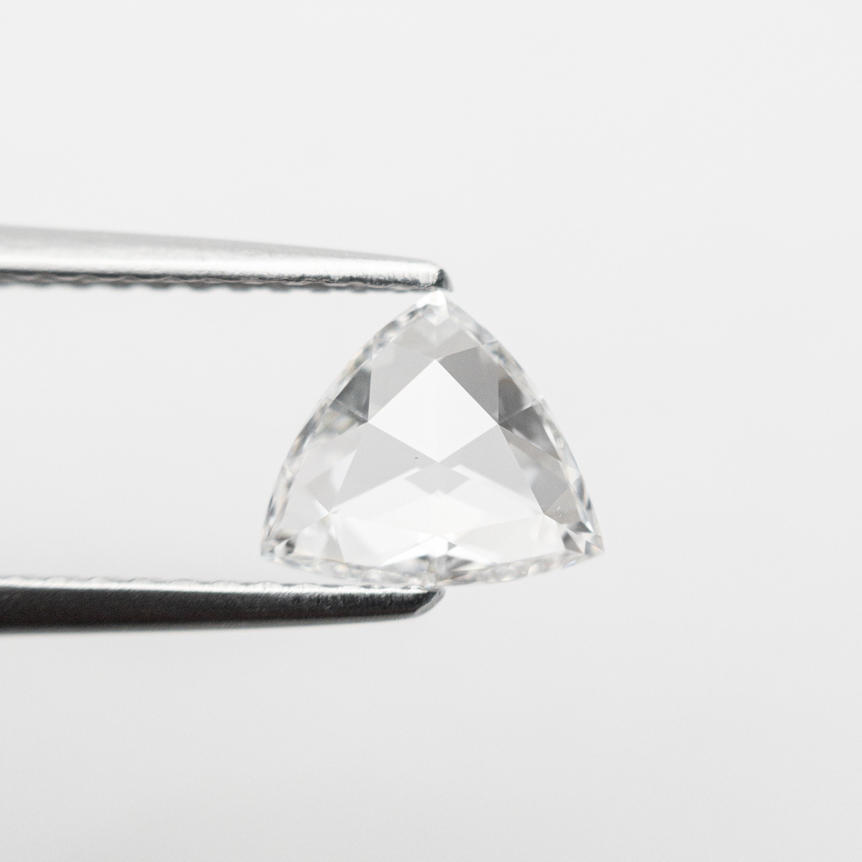 The 0.72ct 6.21x7.16x2.16mm VS2 D Trillion Rosecut 🇨🇦 21157-01 by East London jeweller Rachel Boston | Discover our collections of unique and timeless engagement rings, wedding rings, and modern fine jewellery.