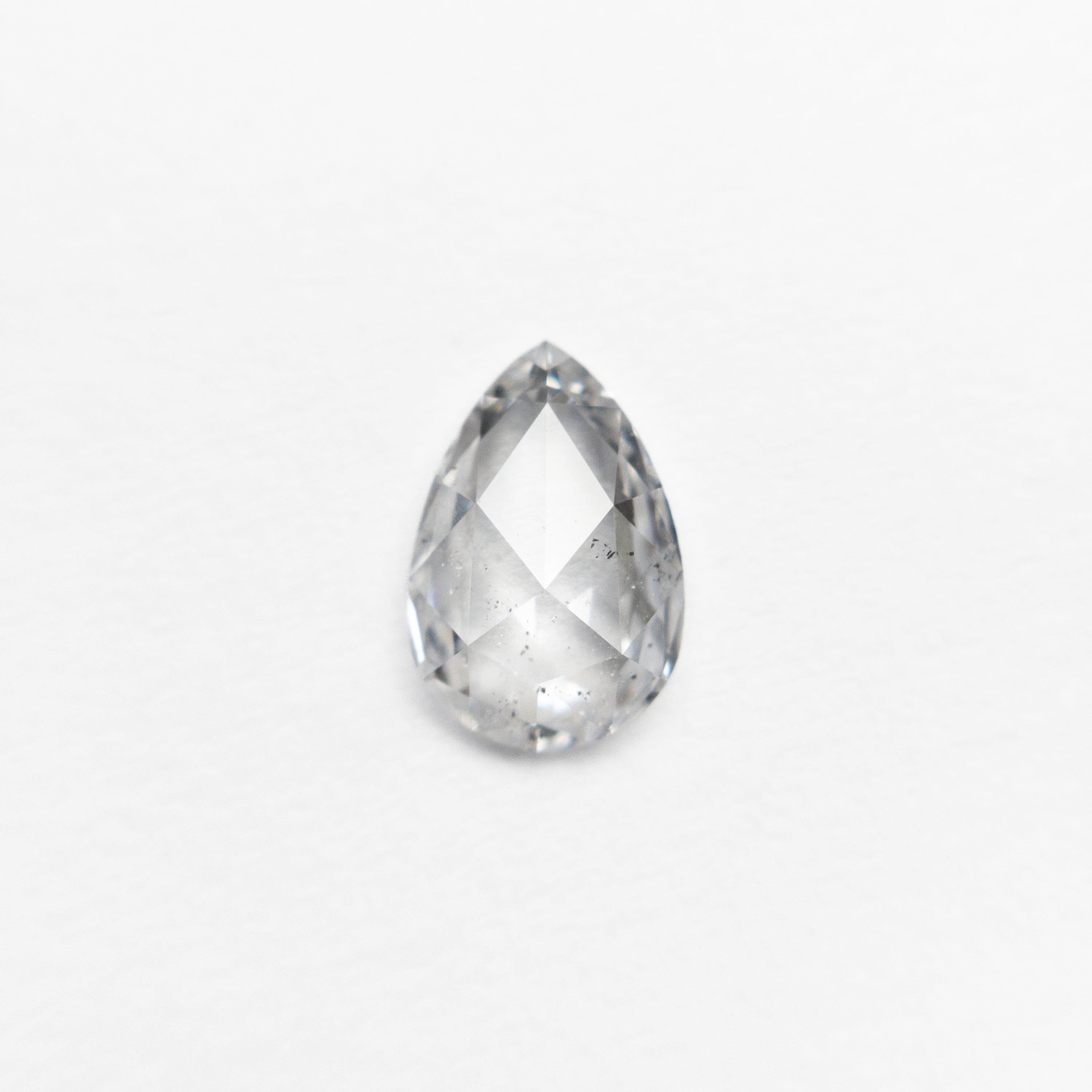 The 0.54ct 7.12x4.75x2.05mm I1 E Pear Rosecut 🇨🇦 21259-01 by East London jeweller Rachel Boston | Discover our collections of unique and timeless engagement rings, wedding rings, and modern fine jewellery.
