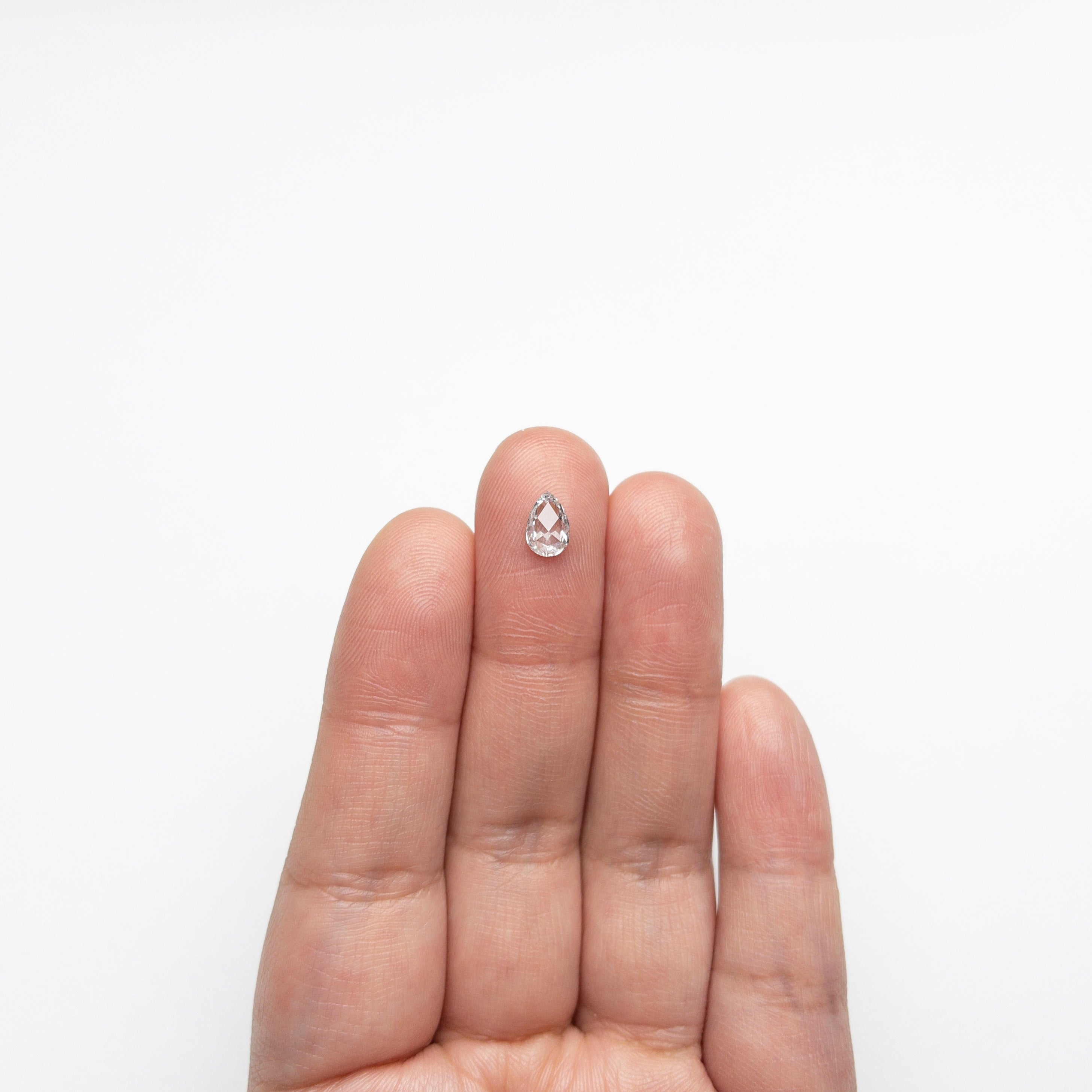 The 0.54ct 7.12x4.75x2.05mm I1 E Pear Rosecut 🇨🇦 21259-01 by East London jeweller Rachel Boston | Discover our collections of unique and timeless engagement rings, wedding rings, and modern fine jewellery.