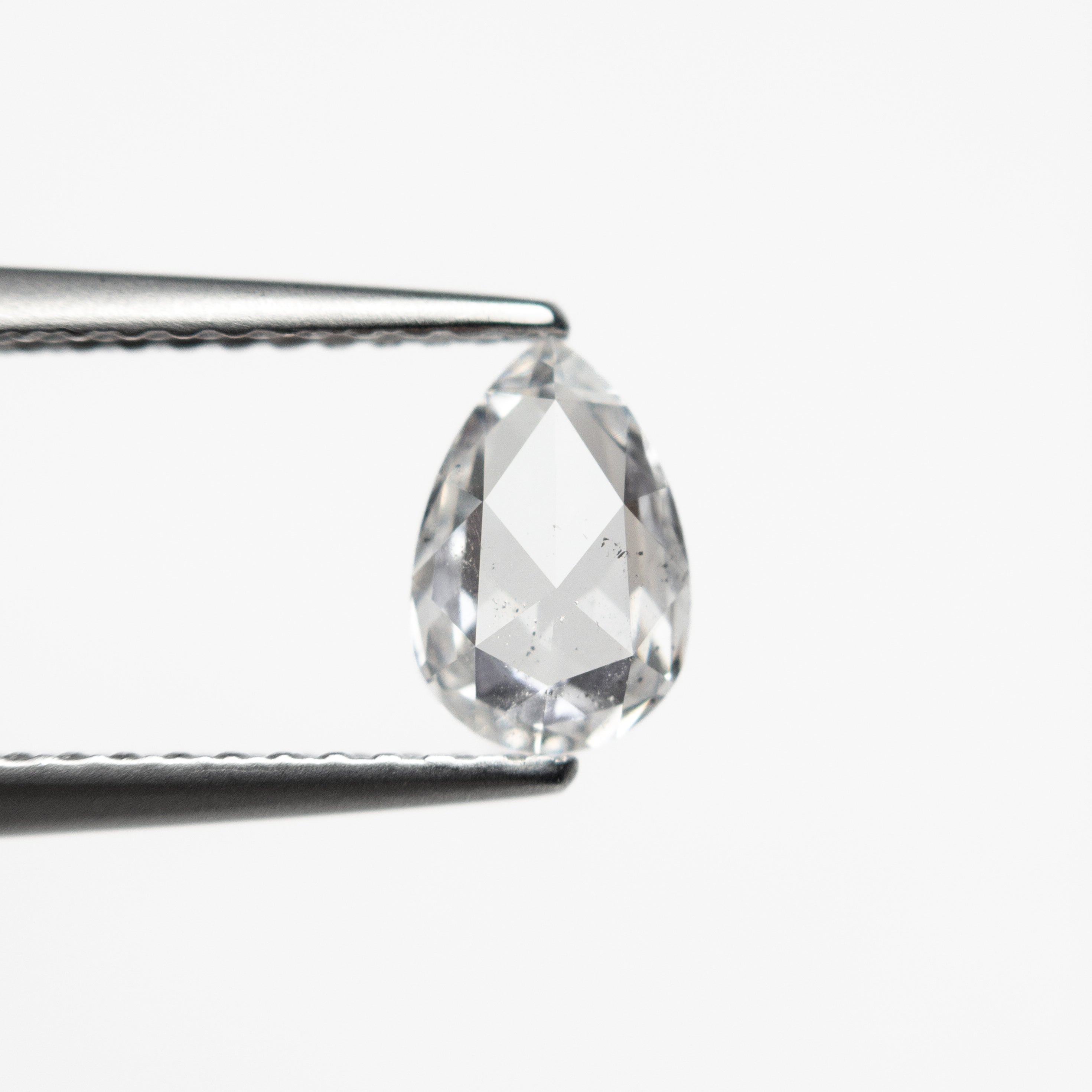 The 0.54ct 7.12x4.75x2.05mm I1 E Pear Rosecut 🇨🇦 21259-01 by East London jeweller Rachel Boston | Discover our collections of unique and timeless engagement rings, wedding rings, and modern fine jewellery.