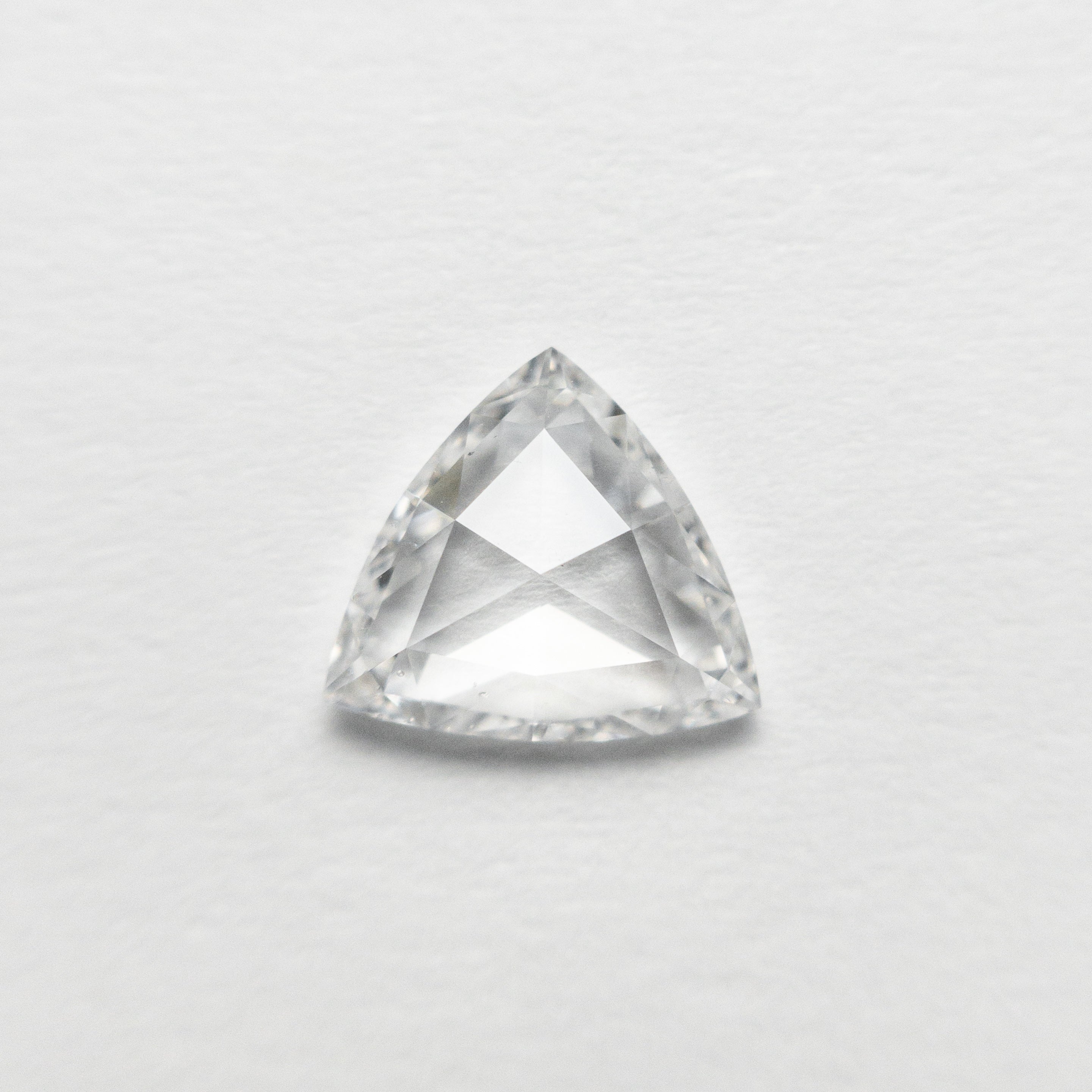 The 0.72ct 6.68x7.38x1.96mm SI1 F Trillion Rosecut 🇨🇦 21300-01 by East London jeweller Rachel Boston | Discover our collections of unique and timeless engagement rings, wedding rings, and modern fine jewellery.