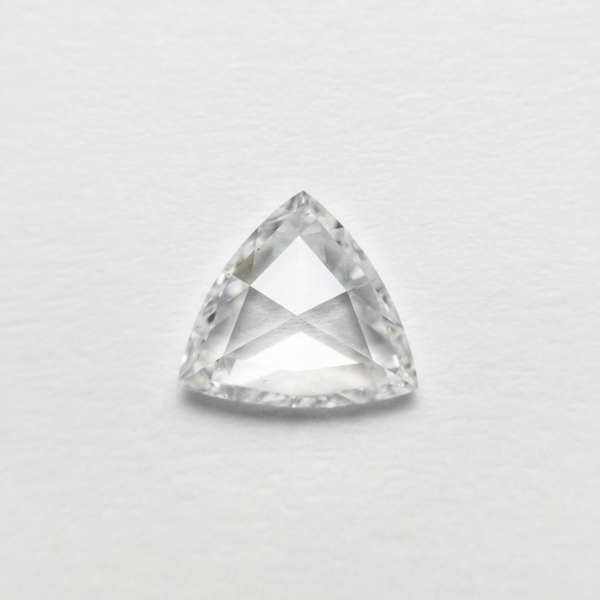 The 0.72ct 6.68x7.38x1.96mm SI1 F Trillion Rosecut 🇨🇦 21300-01 by East London jeweller Rachel Boston | Discover our collections of unique and timeless engagement rings, wedding rings, and modern fine jewellery.