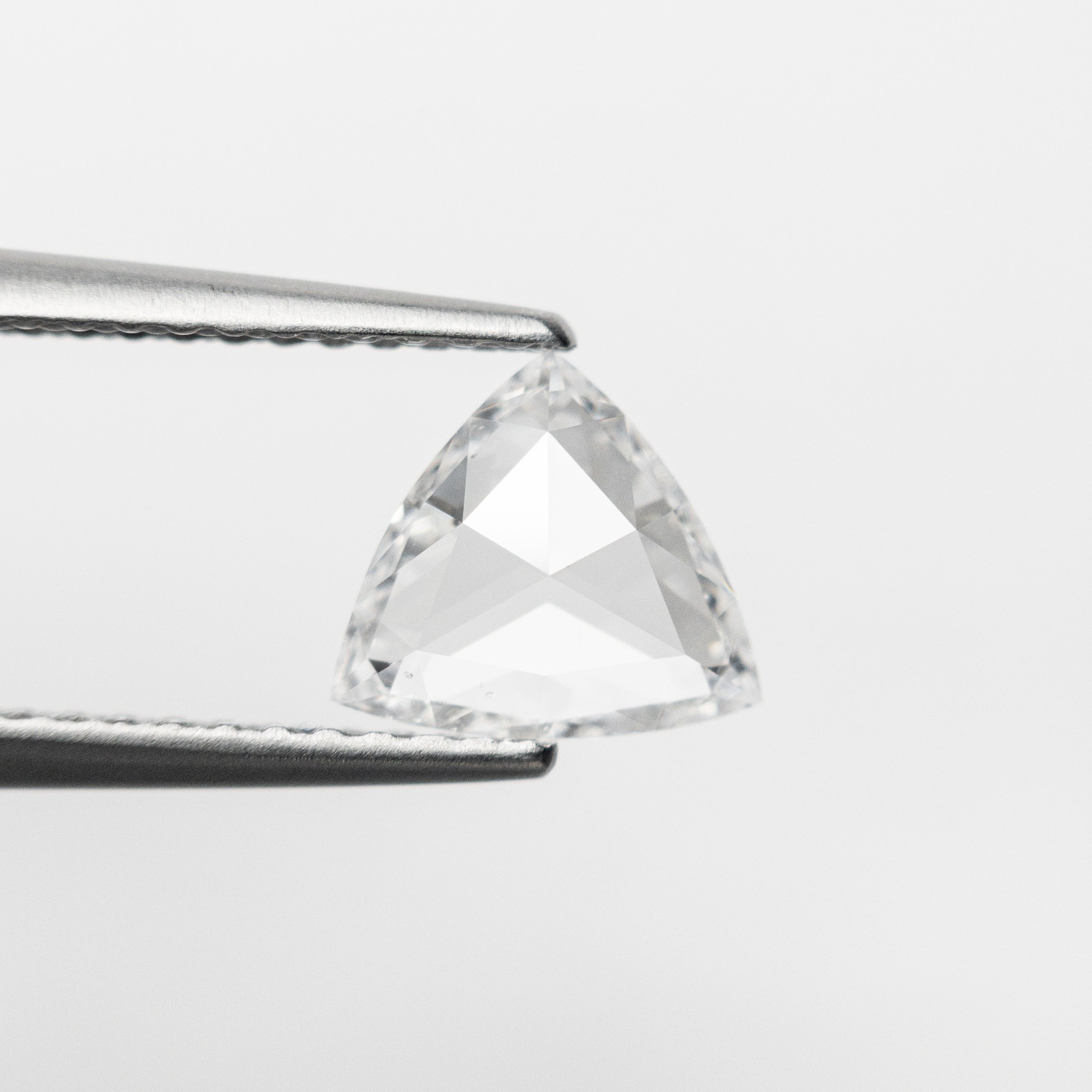 The 0.72ct 6.68x7.38x1.96mm SI1 F Trillion Rosecut 🇨🇦 21300-01 by East London jeweller Rachel Boston | Discover our collections of unique and timeless engagement rings, wedding rings, and modern fine jewellery.