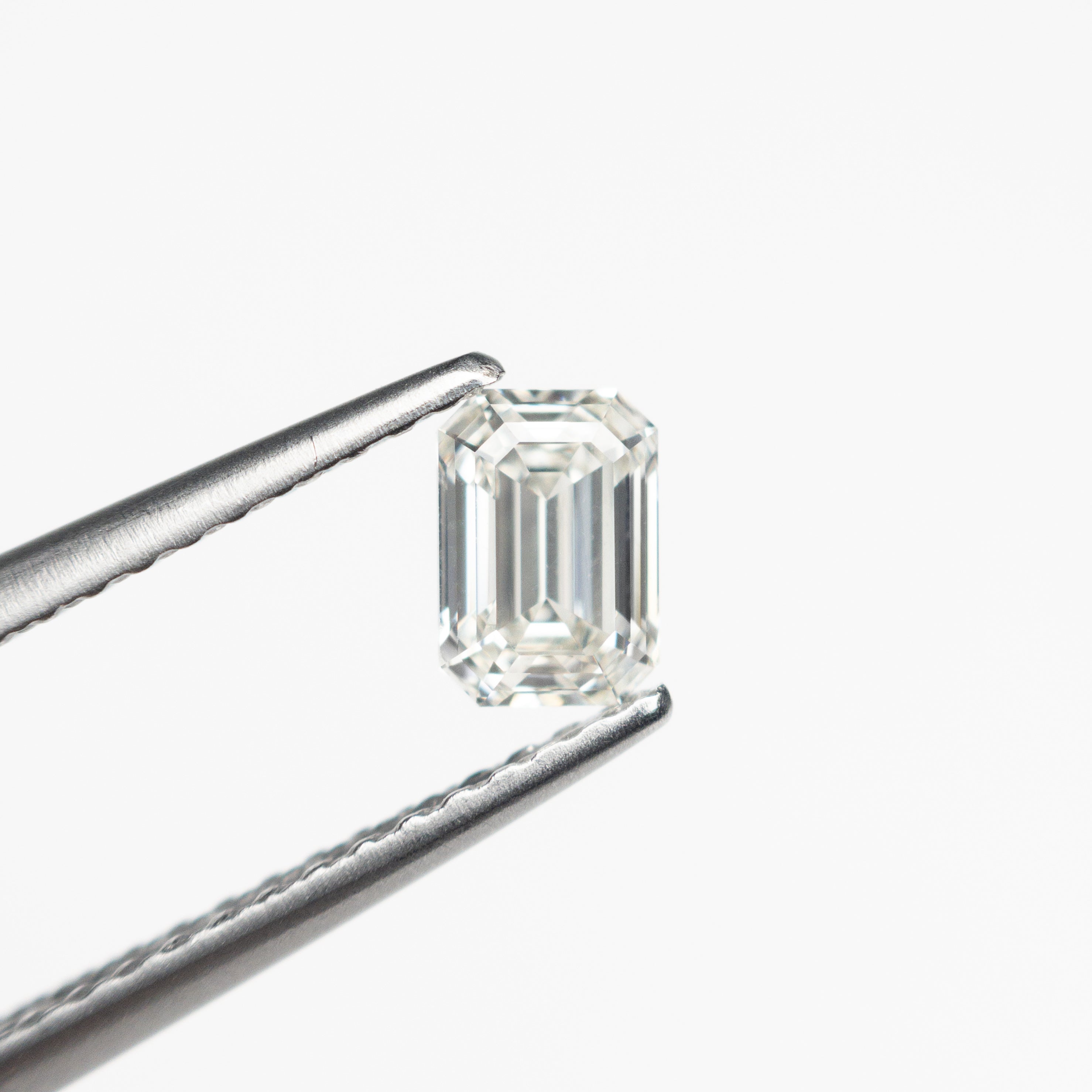 The 0.51ct 5.30x3.71x2.56mm VS2 J Cut Corner Rectangle Step Cut 🇨🇦 21307-01 by East London jeweller Rachel Boston | Discover our collections of unique and timeless engagement rings, wedding rings, and modern fine jewellery.