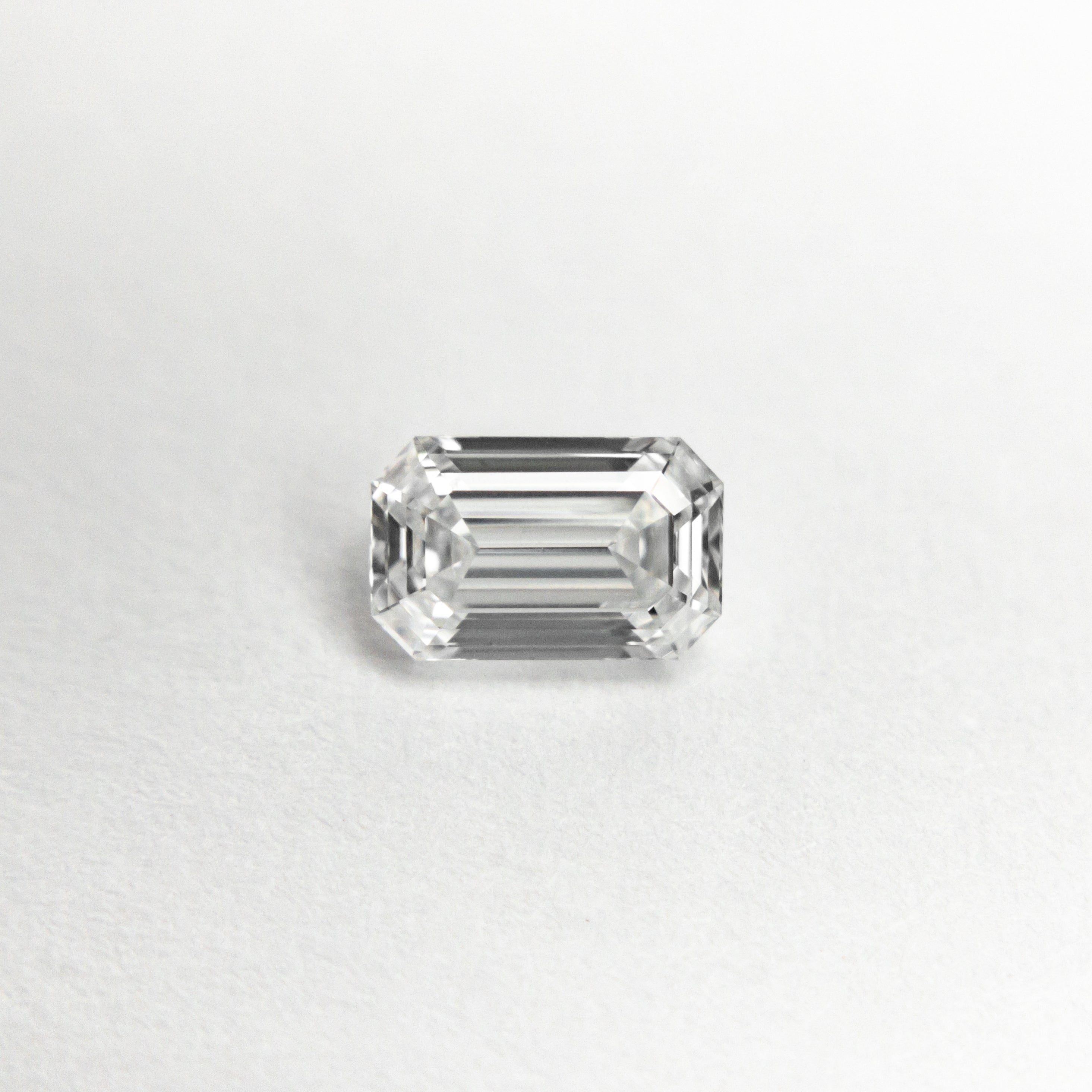 The 0.50ct 5.70x3.62x2.35mm VVS2 E Cut Corner Rectangle Step Cut 🇨🇦 21311-01 by East London jeweller Rachel Boston | Discover our collections of unique and timeless engagement rings, wedding rings, and modern fine jewellery.