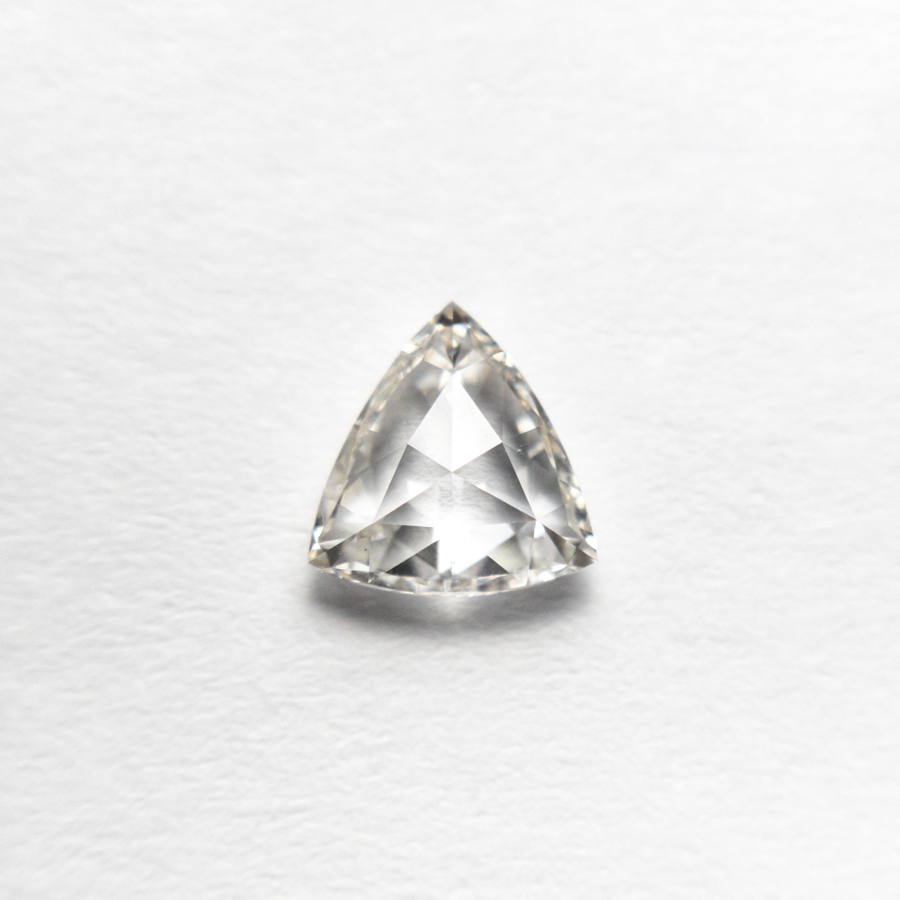 The 0.61ct 6.00x5.87x2.44mm VS2 L Trillion Rosecut 🇨🇦 21319-01 by East London jeweller Rachel Boston | Discover our collections of unique and timeless engagement rings, wedding rings, and modern fine jewellery.