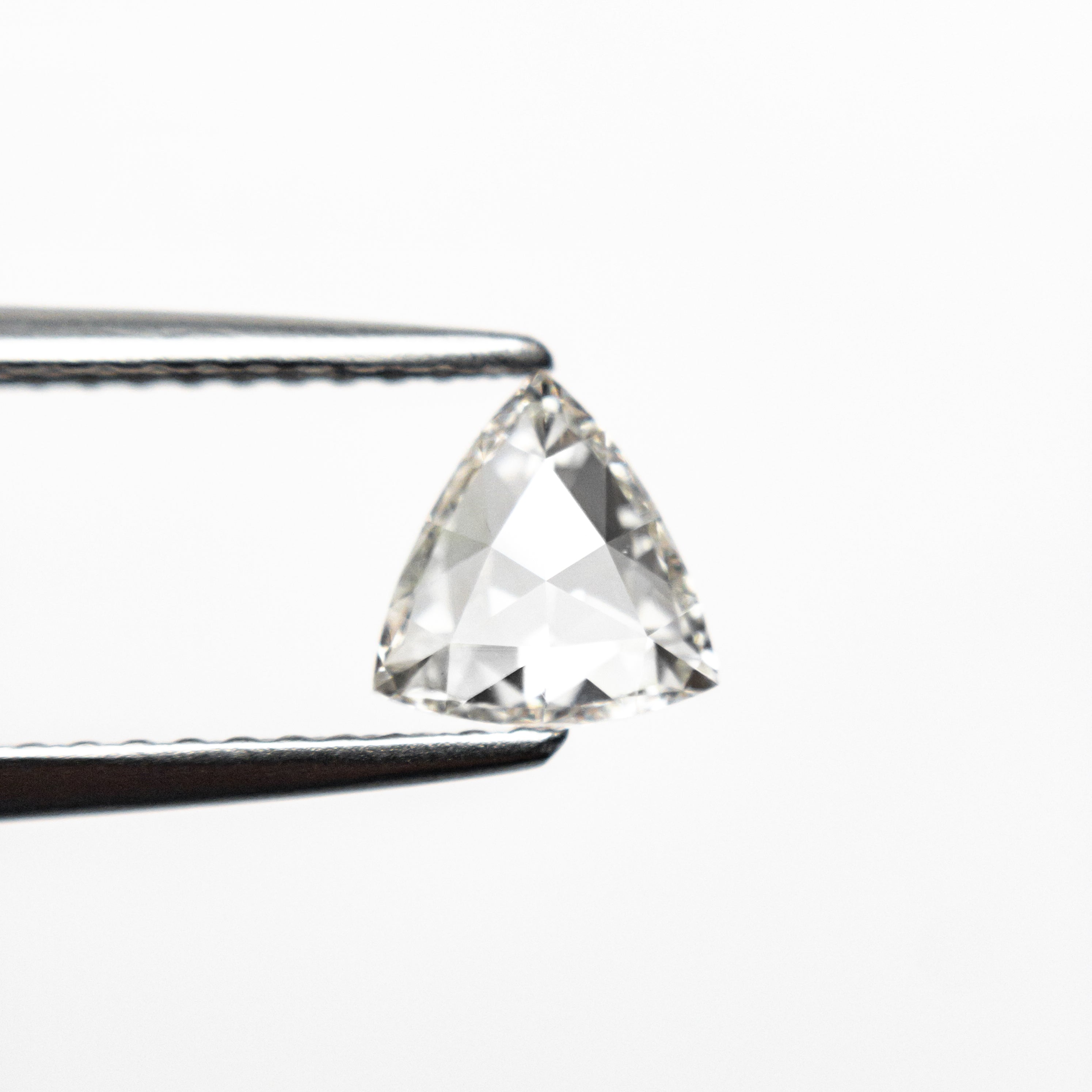 The 0.61ct 6.00x5.87x2.44mm VS2 L Trillion Rosecut 🇨🇦 21319-01 by East London jeweller Rachel Boston | Discover our collections of unique and timeless engagement rings, wedding rings, and modern fine jewellery.