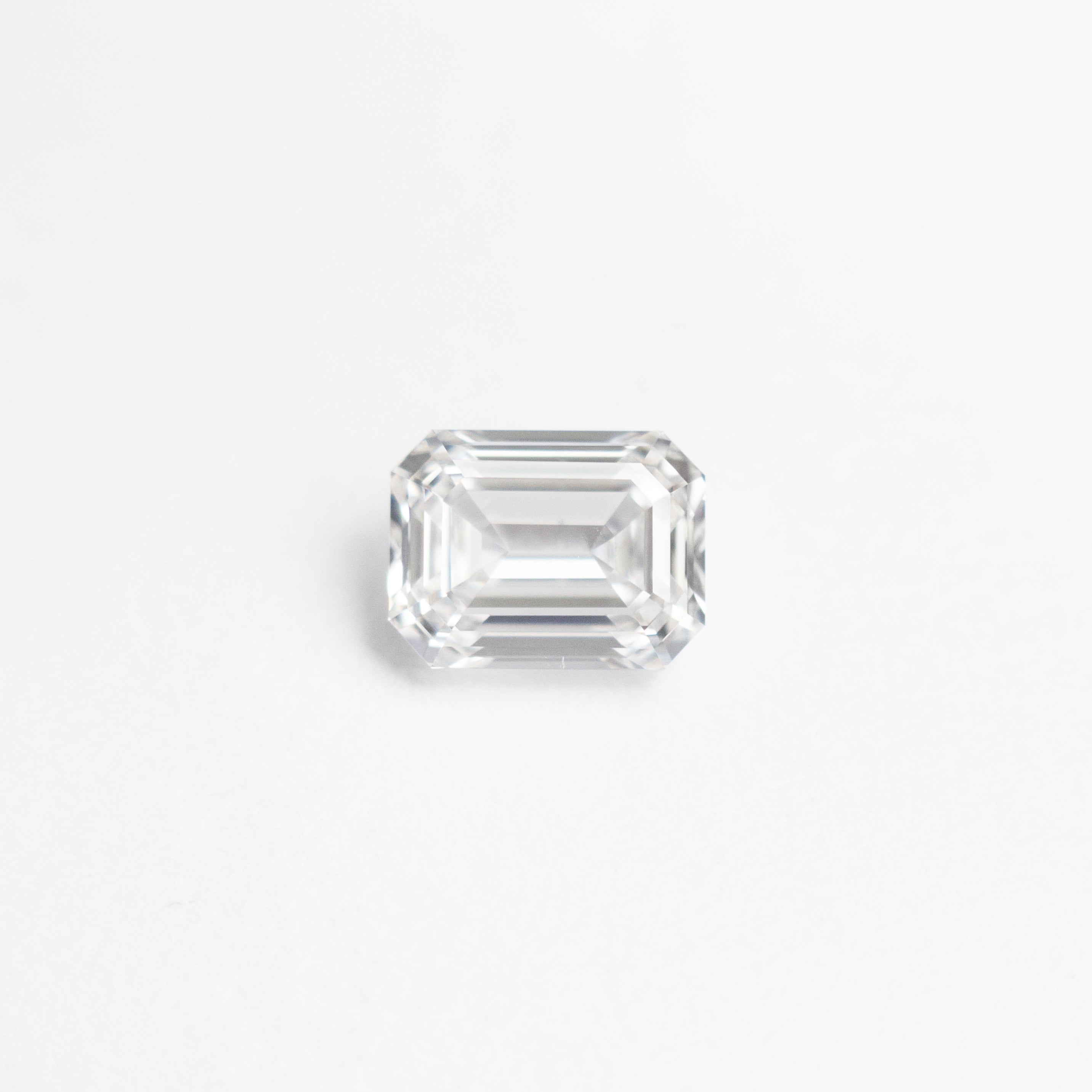 The 0.51ct 5.13x3.90x2.45mm SI1 E Cut Corner Rectangle Step Cut 🇨🇦 21322-01 by East London jeweller Rachel Boston | Discover our collections of unique and timeless engagement rings, wedding rings, and modern fine jewellery.