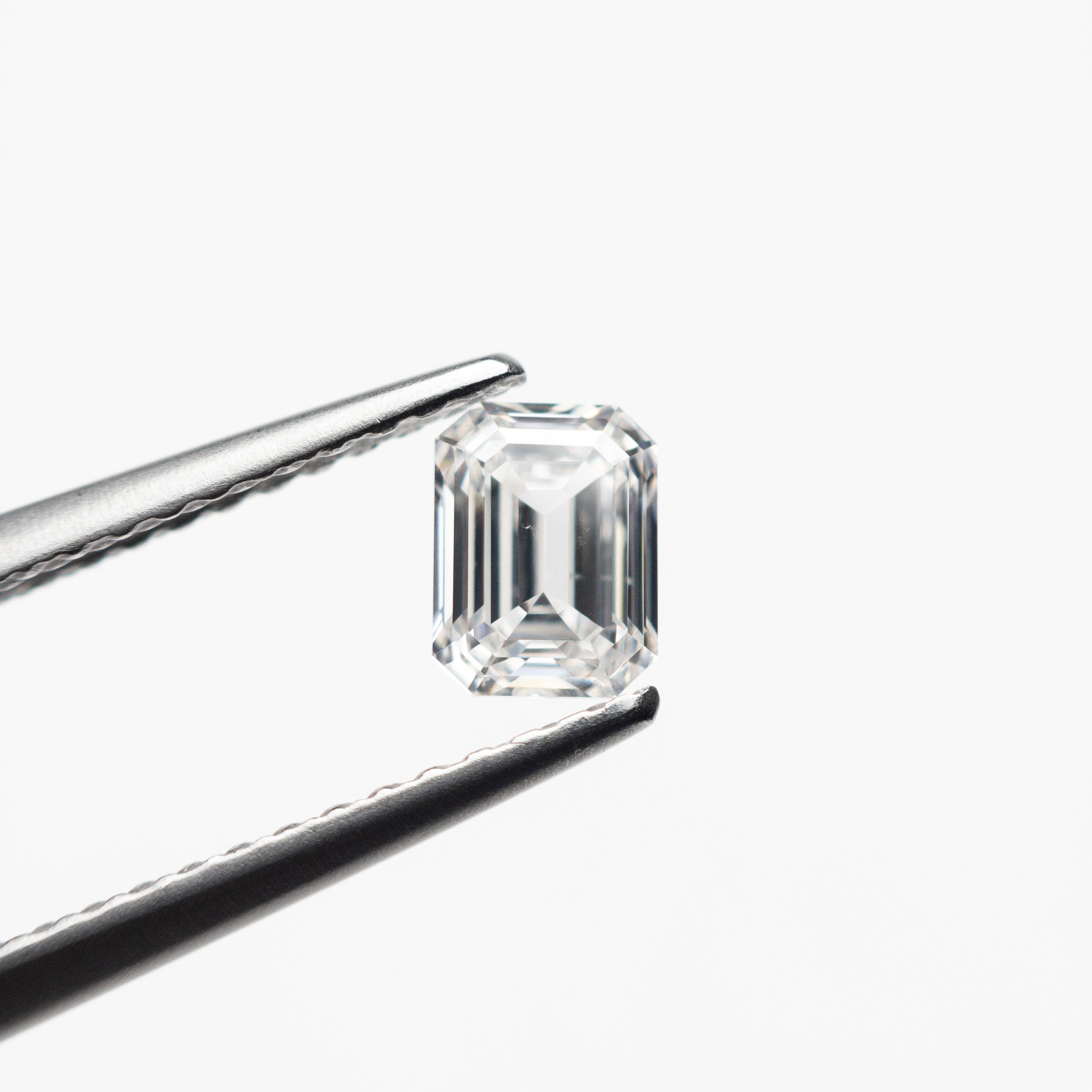 The 0.51ct 5.13x3.90x2.45mm SI1 E Cut Corner Rectangle Step Cut 🇨🇦 21322-01 by East London jeweller Rachel Boston | Discover our collections of unique and timeless engagement rings, wedding rings, and modern fine jewellery.