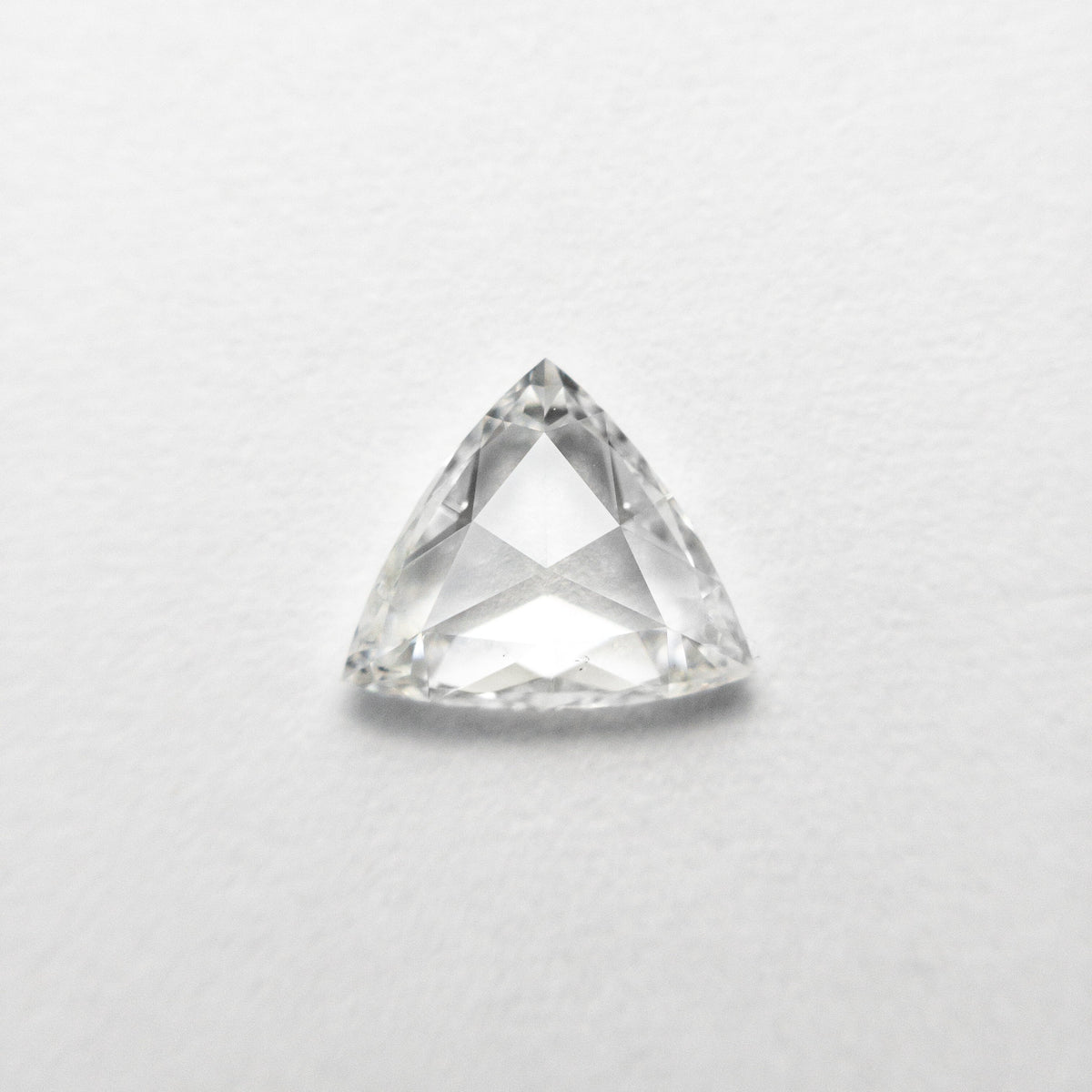 The 0.72ct 6.25x7.35x2.17mm SI1 H Trillion Rosecut 🇨🇦 21324-01 by East London jeweller Rachel Boston | Discover our collections of unique and timeless engagement rings, wedding rings, and modern fine jewellery.