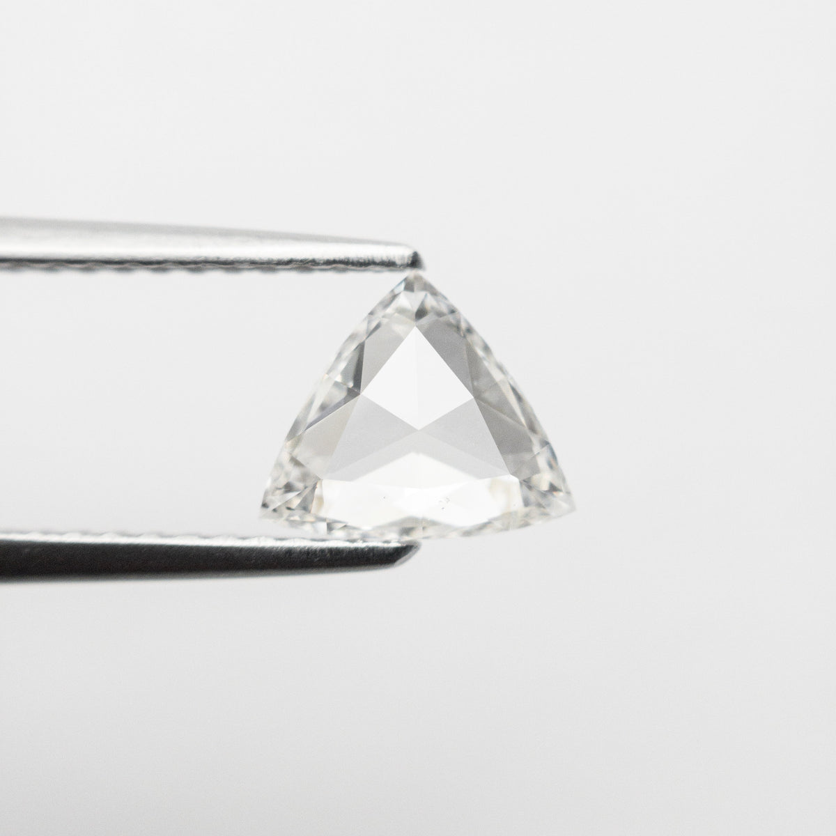 The 0.72ct 6.25x7.35x2.17mm SI1 H Trillion Rosecut 🇨🇦 21324-01 by East London jeweller Rachel Boston | Discover our collections of unique and timeless engagement rings, wedding rings, and modern fine jewellery.