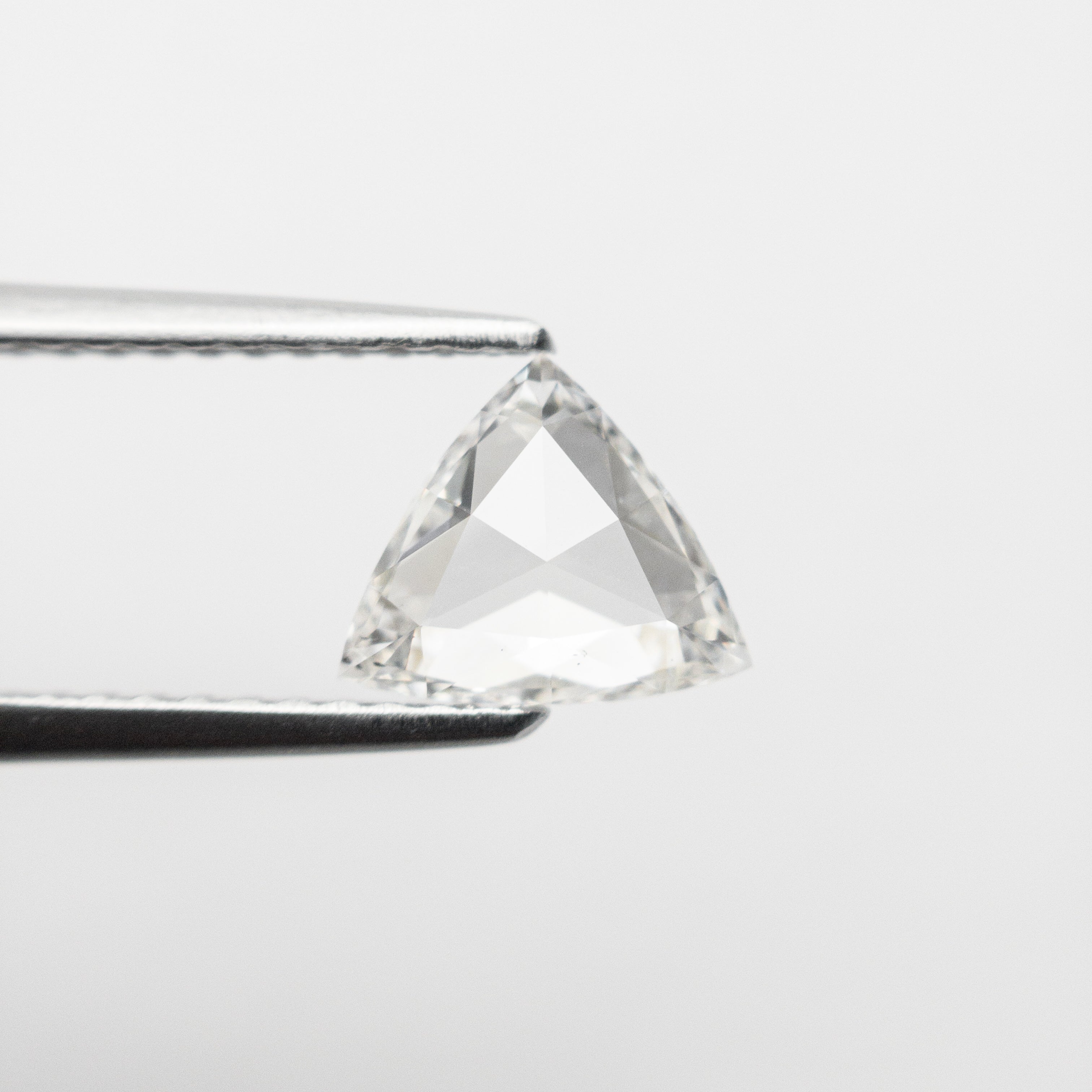 The 0.72ct 6.25x7.35x2.17mm SI1 H Trillion Rosecut 🇨🇦 21324-01 by East London jeweller Rachel Boston | Discover our collections of unique and timeless engagement rings, wedding rings, and modern fine jewellery.