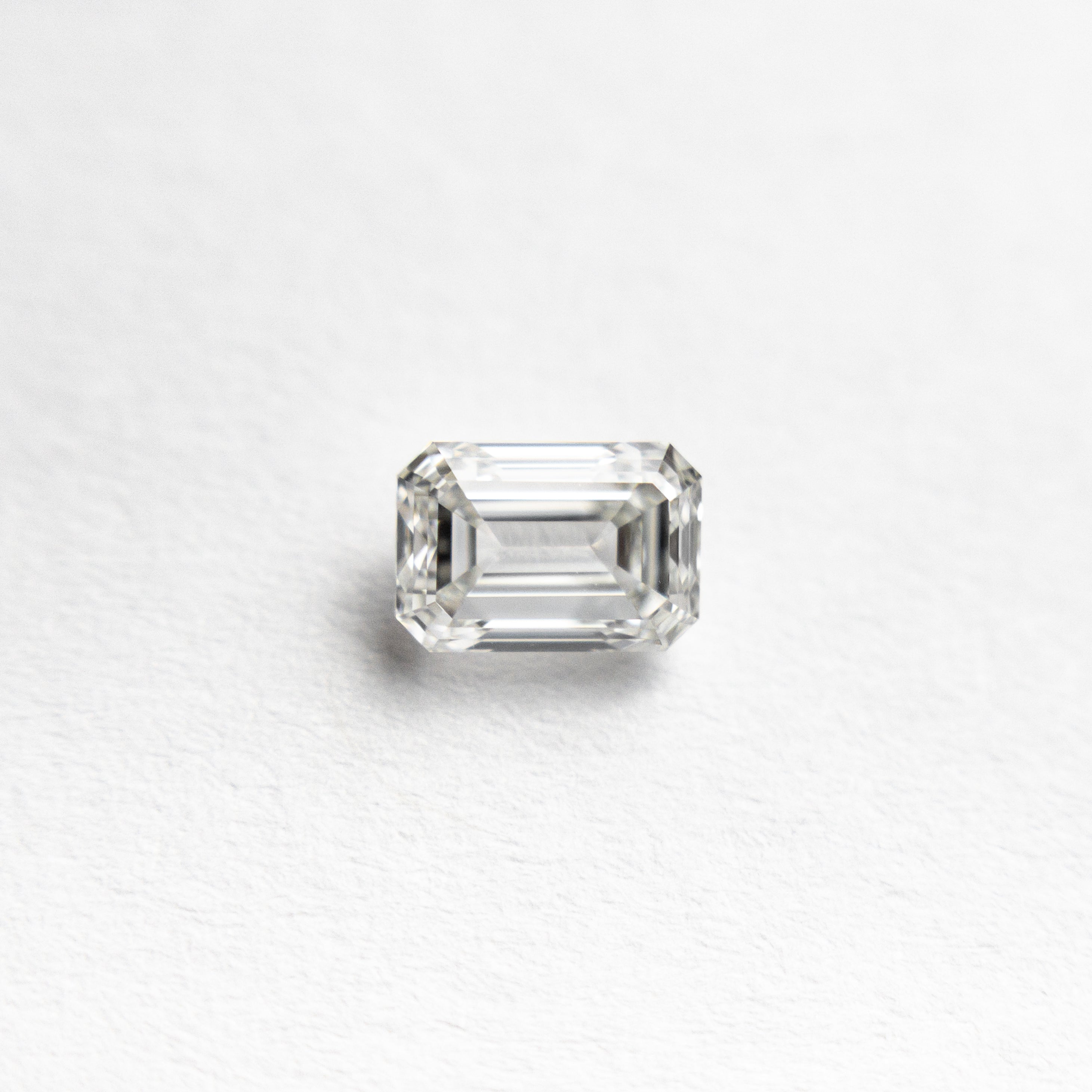 The 0.45ct 4.94x3.46x2.45mm VVS G Cut Corner Rectangle Step Cut 🇨🇦 21345-01 by East London jeweller Rachel Boston | Discover our collections of unique and timeless engagement rings, wedding rings, and modern fine jewellery.