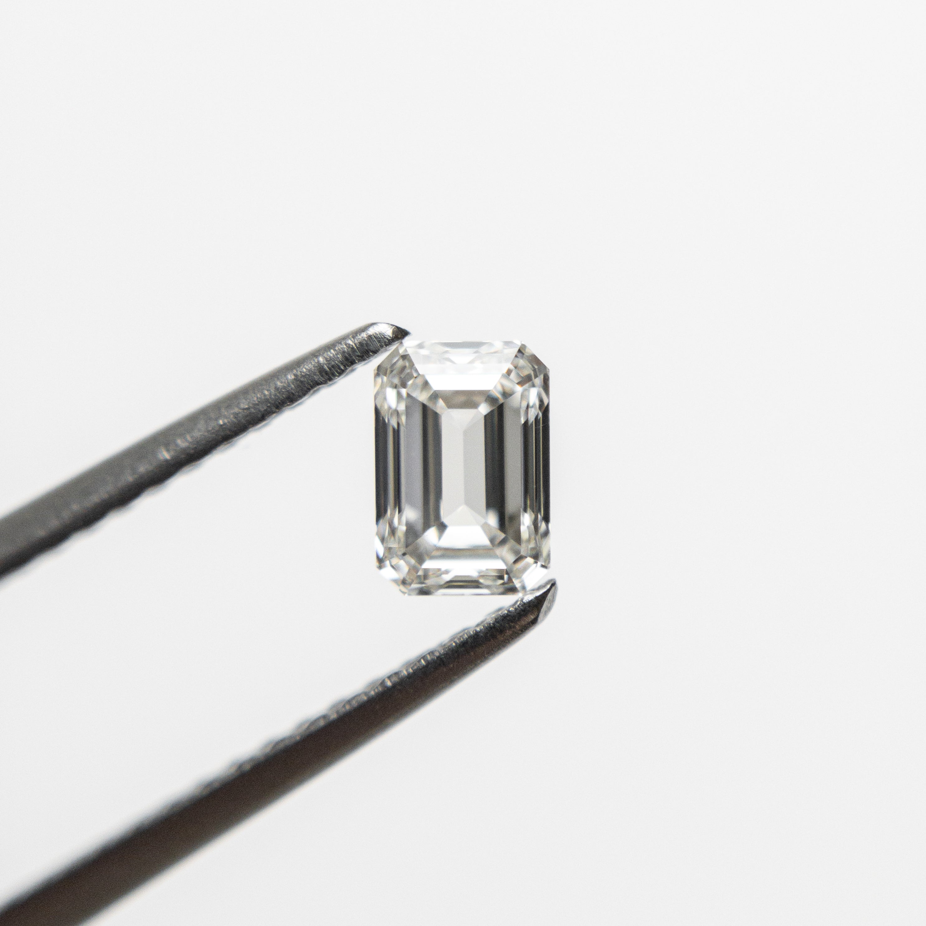 The 0.45ct 4.94x3.46x2.45mm VVS G Cut Corner Rectangle Step Cut 🇨🇦 21345-01 by East London jeweller Rachel Boston | Discover our collections of unique and timeless engagement rings, wedding rings, and modern fine jewellery.