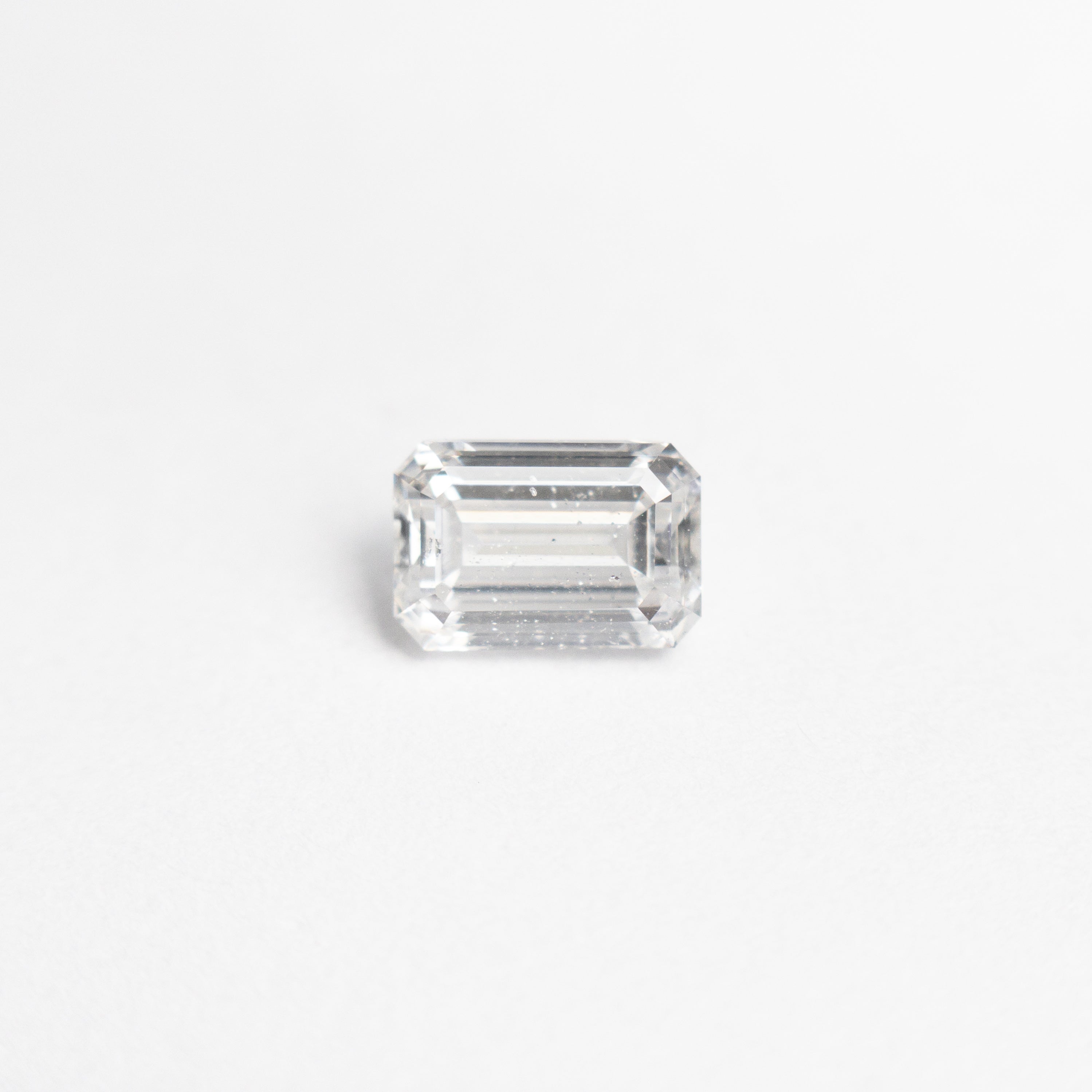 The 0.50ct 5.27x3.60x2.46mm I1 E Cut Corner Rectangle Step Cut 🇨🇦 21415-01 by East London jeweller Rachel Boston | Discover our collections of unique and timeless engagement rings, wedding rings, and modern fine jewellery.