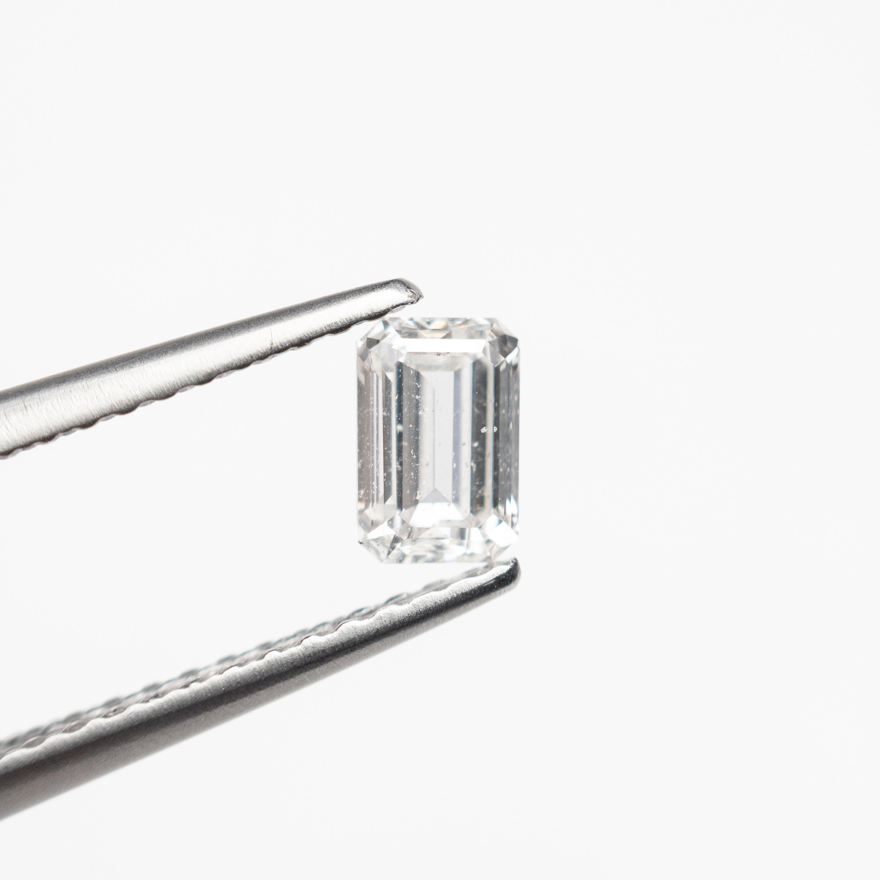 The 0.50ct 5.27x3.60x2.46mm I1 E Cut Corner Rectangle Step Cut 🇨🇦 21415-01 by East London jeweller Rachel Boston | Discover our collections of unique and timeless engagement rings, wedding rings, and modern fine jewellery.