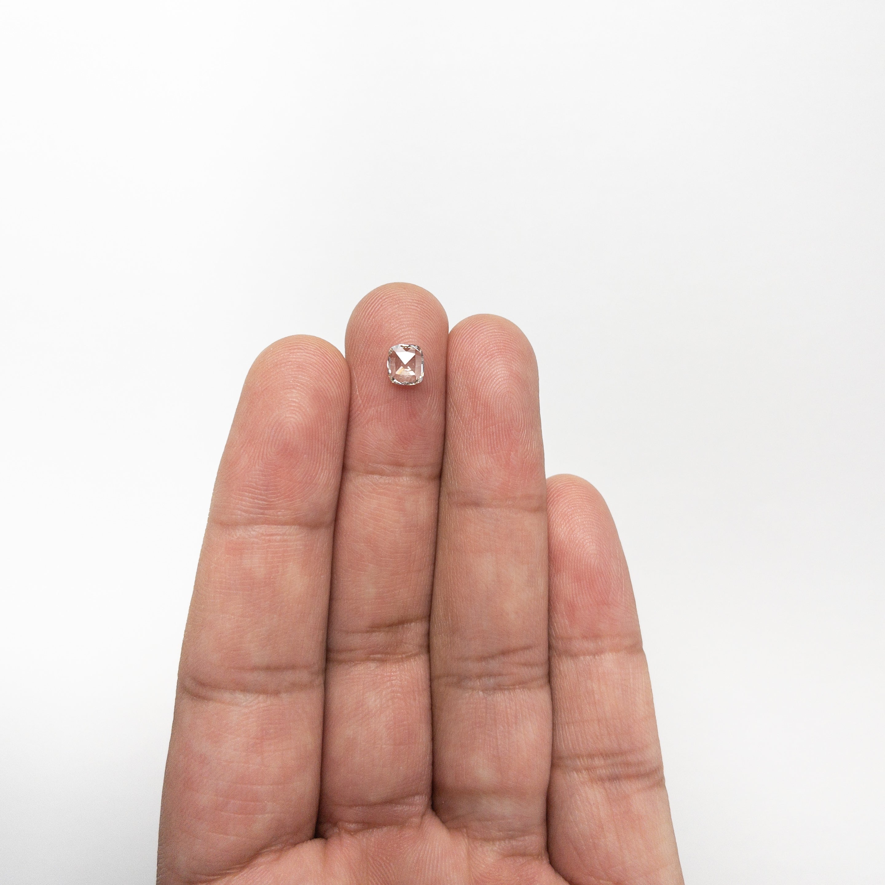 The 0.50ct 5.39x4.84x1.85mm I1 J Cushion Rosecut 🇨🇦 21514-01 by East London jeweller Rachel Boston | Discover our collections of unique and timeless engagement rings, wedding rings, and modern fine jewellery.