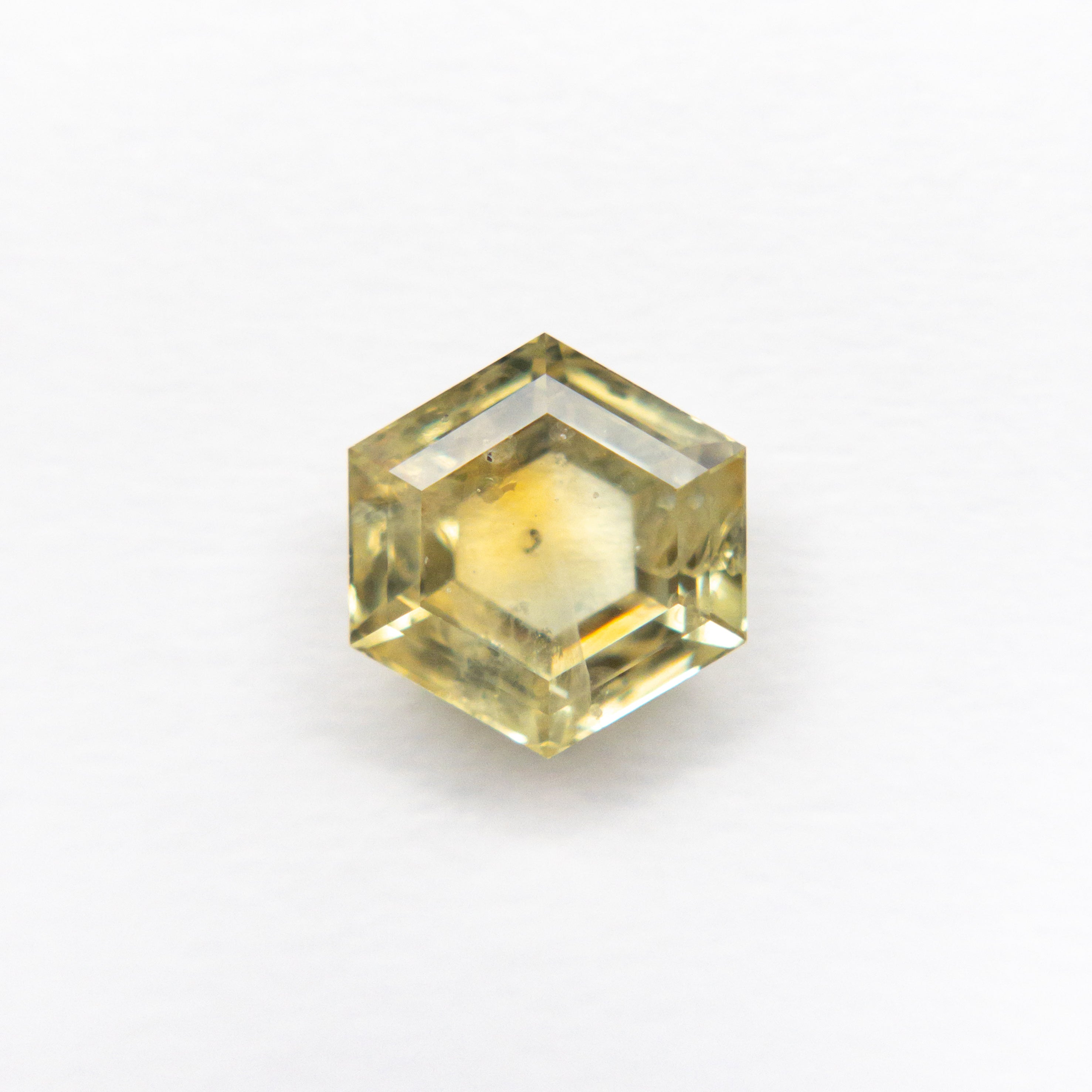 The 1.51ct 6.53x6.97x3.31 Hexagon Double Cut Sapphire 21592-09 by East London jeweller Rachel Boston | Discover our collections of unique and timeless engagement rings, wedding rings, and modern fine jewellery.
