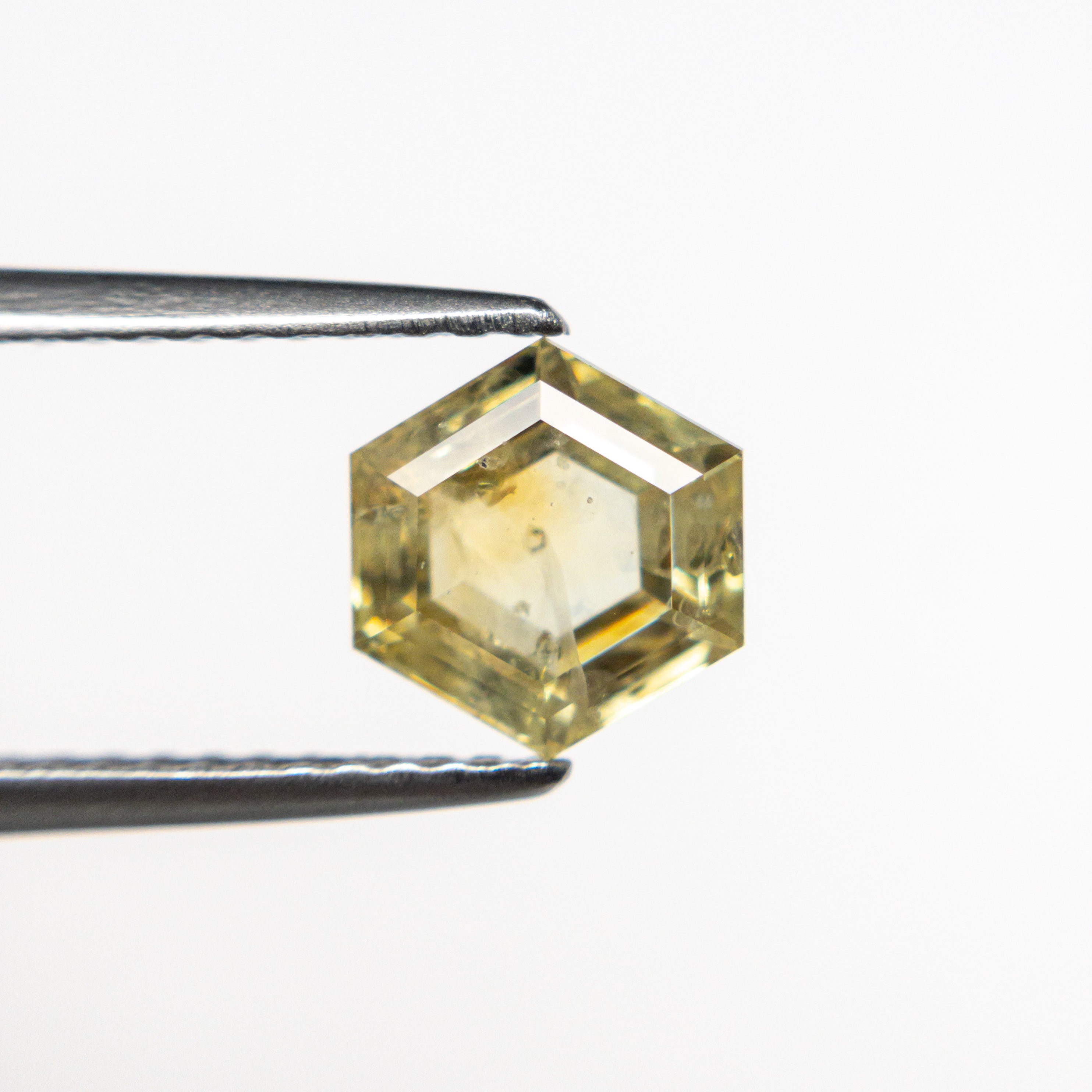The 1.51ct 6.53x6.97x3.31 Hexagon Double Cut Sapphire 21592-09 by East London jeweller Rachel Boston | Discover our collections of unique and timeless engagement rings, wedding rings, and modern fine jewellery.