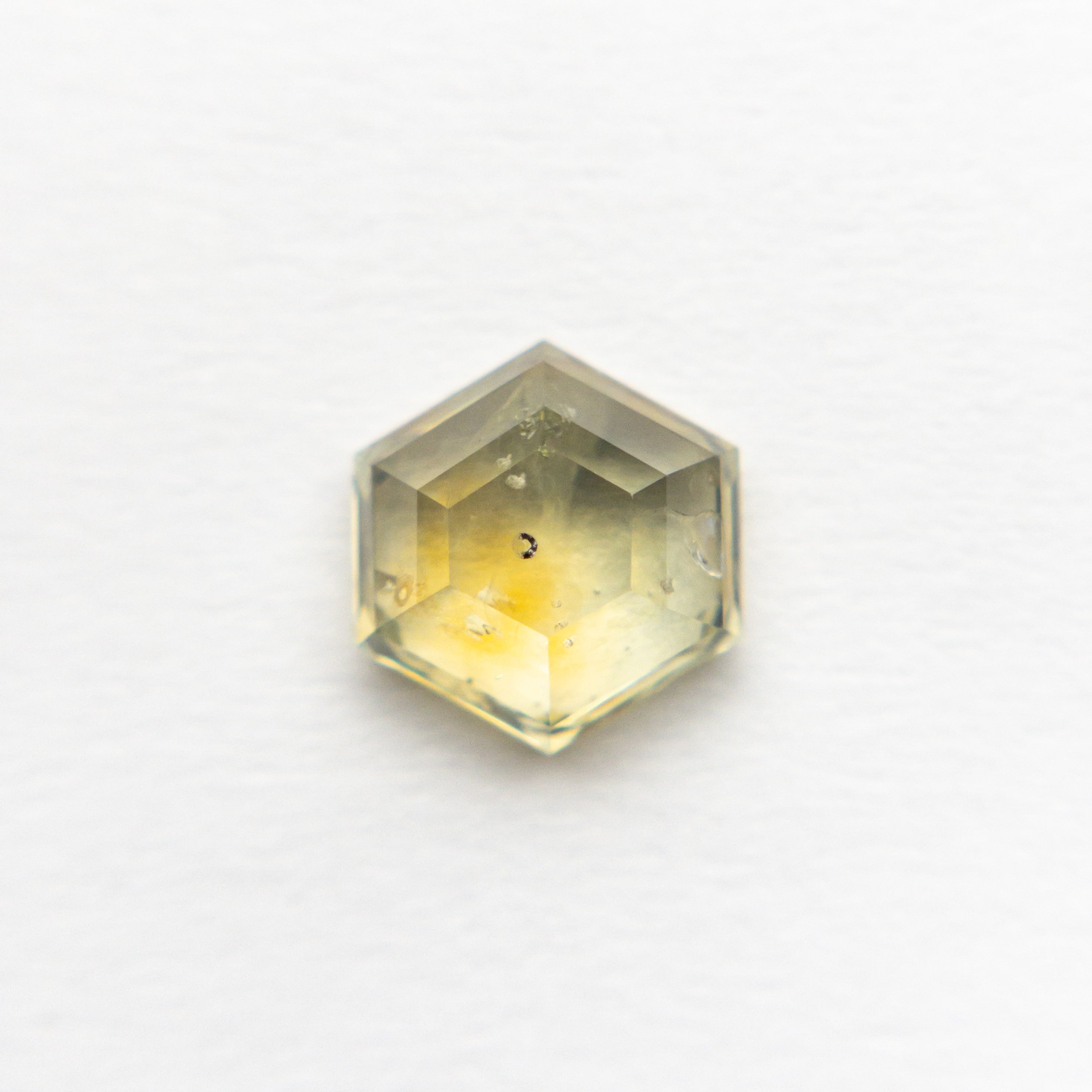 The 1.51ct 6.53x6.97x3.31 Hexagon Double Cut Sapphire 21592-09 by East London jeweller Rachel Boston | Discover our collections of unique and timeless engagement rings, wedding rings, and modern fine jewellery.