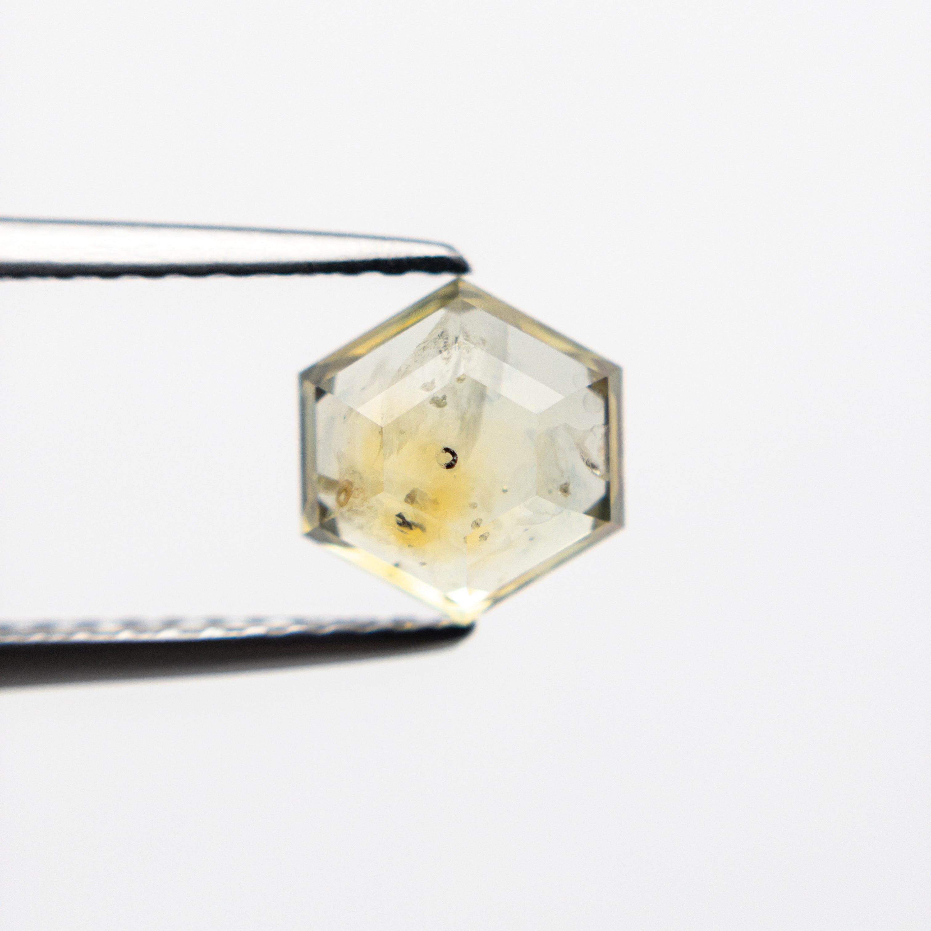 The 1.51ct 6.53x6.97x3.31 Hexagon Double Cut Sapphire 21592-09 by East London jeweller Rachel Boston | Discover our collections of unique and timeless engagement rings, wedding rings, and modern fine jewellery.