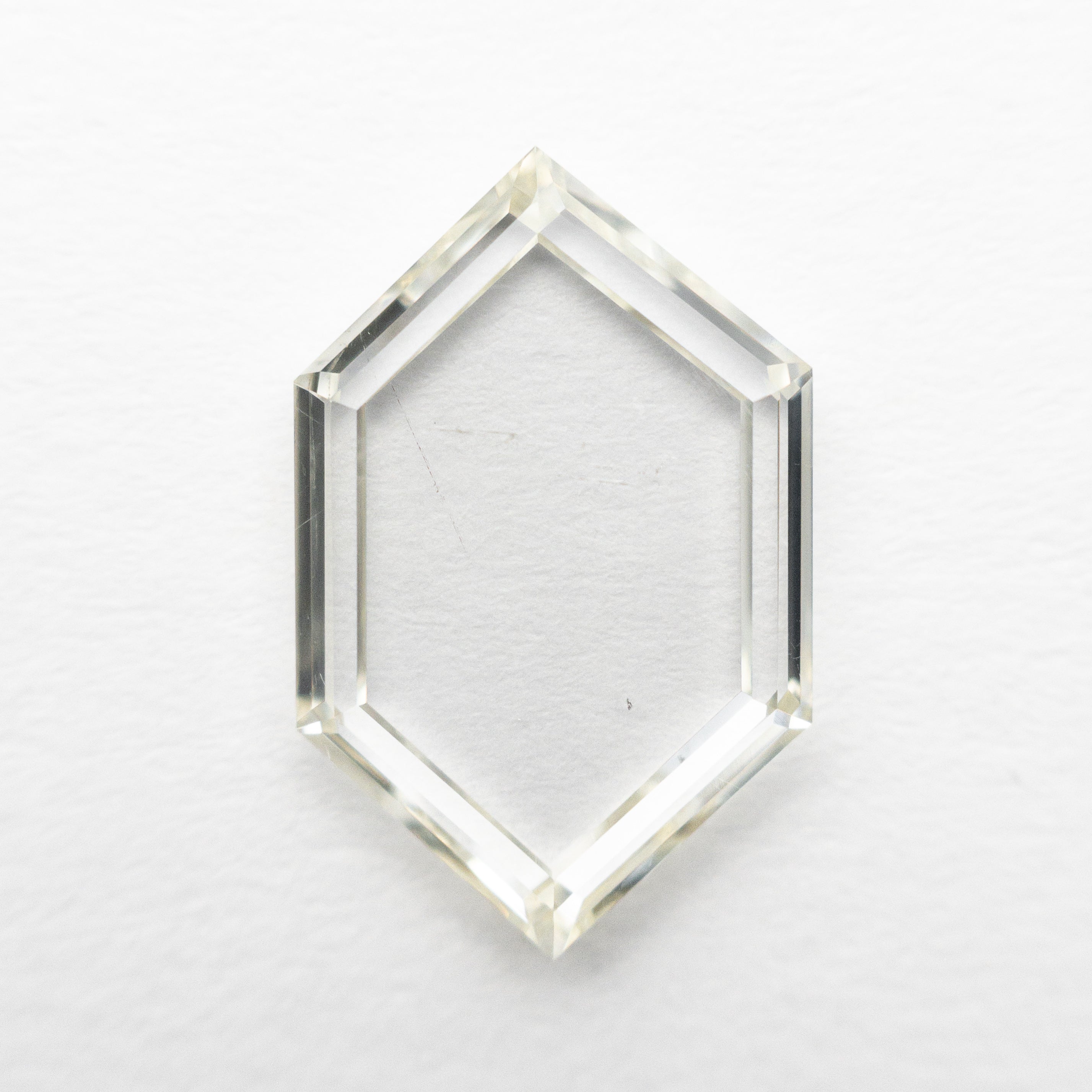 The 2.37ct 13.28x8.43x2.07mm SI2 L Hexagon Portrait Cut 21688-01 by East London jeweller Rachel Boston | Discover our collections of unique and timeless engagement rings, wedding rings, and modern fine jewellery.