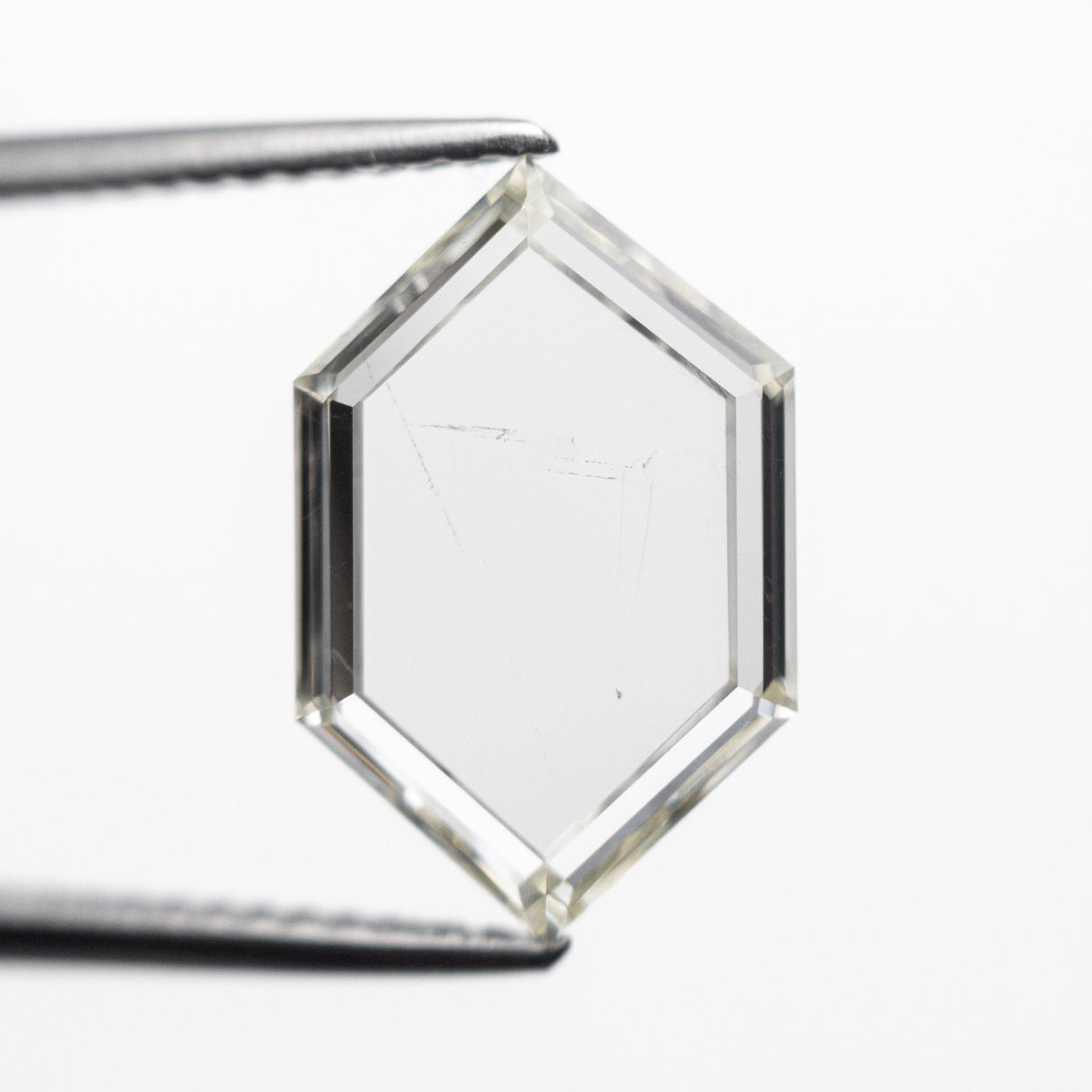 The 2.37ct 13.28x8.43x2.07mm SI2 L Hexagon Portrait Cut 21688-01 by East London jeweller Rachel Boston | Discover our collections of unique and timeless engagement rings, wedding rings, and modern fine jewellery.