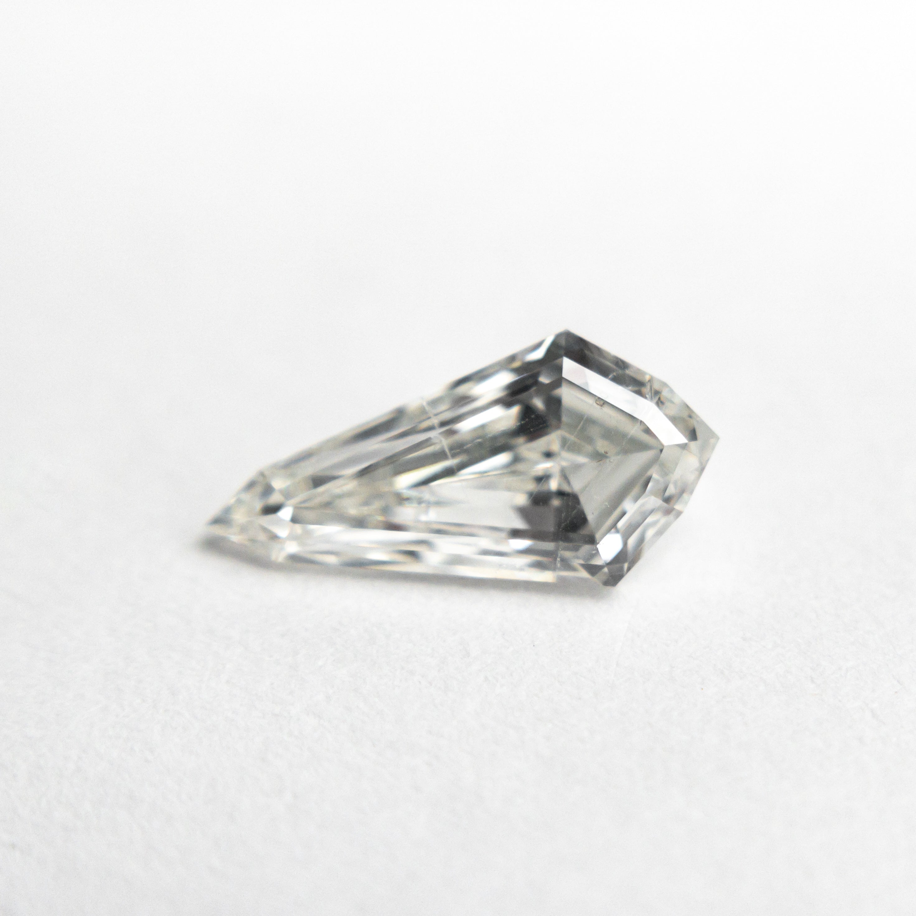 The 1.02ct 10.37x5.12x3.26mm SI2 G Kite Step Cut 21690-02 by East London jeweller Rachel Boston | Discover our collections of unique and timeless engagement rings, wedding rings, and modern fine jewellery.