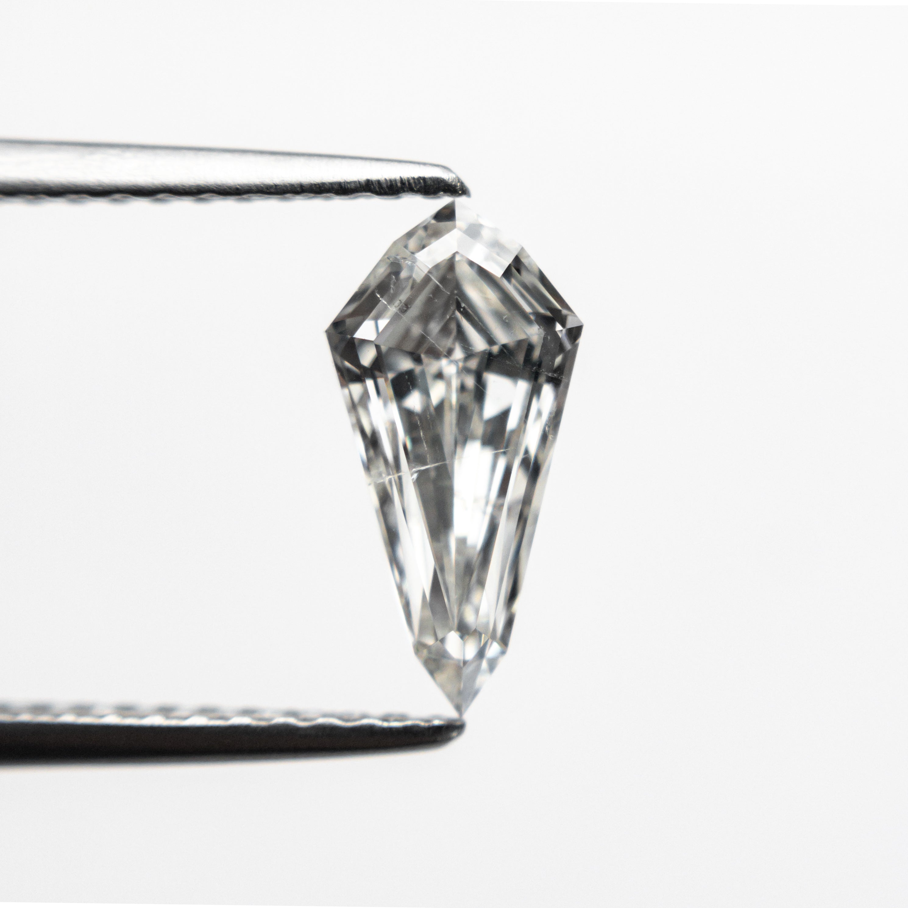 The 1.02ct 10.37x5.12x3.26mm SI2 G Kite Step Cut 21690-02 by East London jeweller Rachel Boston | Discover our collections of unique and timeless engagement rings, wedding rings, and modern fine jewellery.