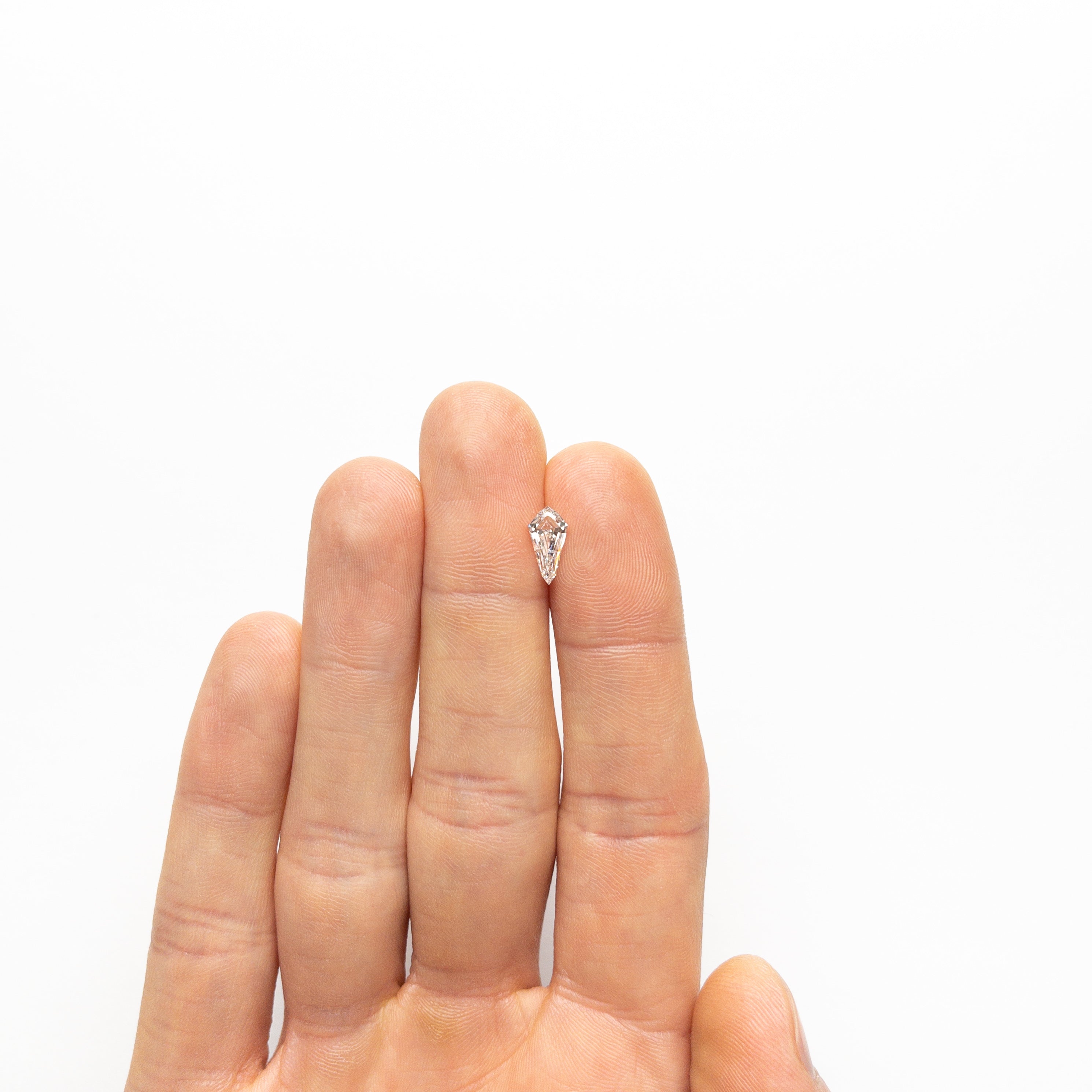 The 1.02ct 10.37x5.12x3.26mm SI2 G Kite Step Cut 21690-02 by East London jeweller Rachel Boston | Discover our collections of unique and timeless engagement rings, wedding rings, and modern fine jewellery.