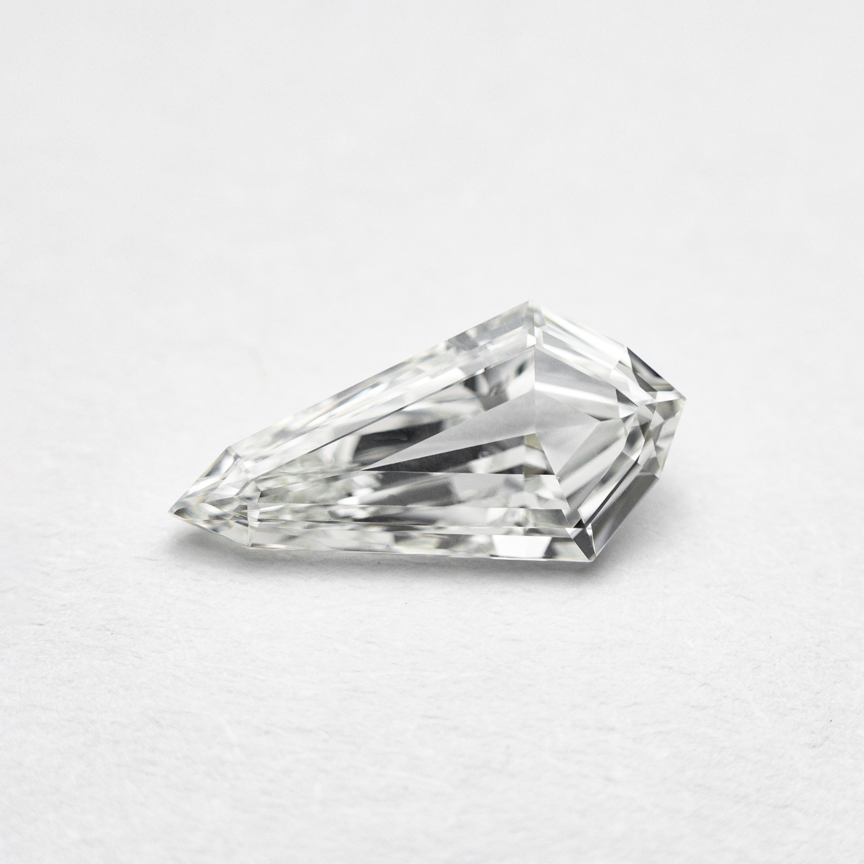 The 0.70ct 10.00x5.10x2.21mm VS2 G Kite Step Cut 21690-05 by East London jeweller Rachel Boston | Discover our collections of unique and timeless engagement rings, wedding rings, and modern fine jewellery.
