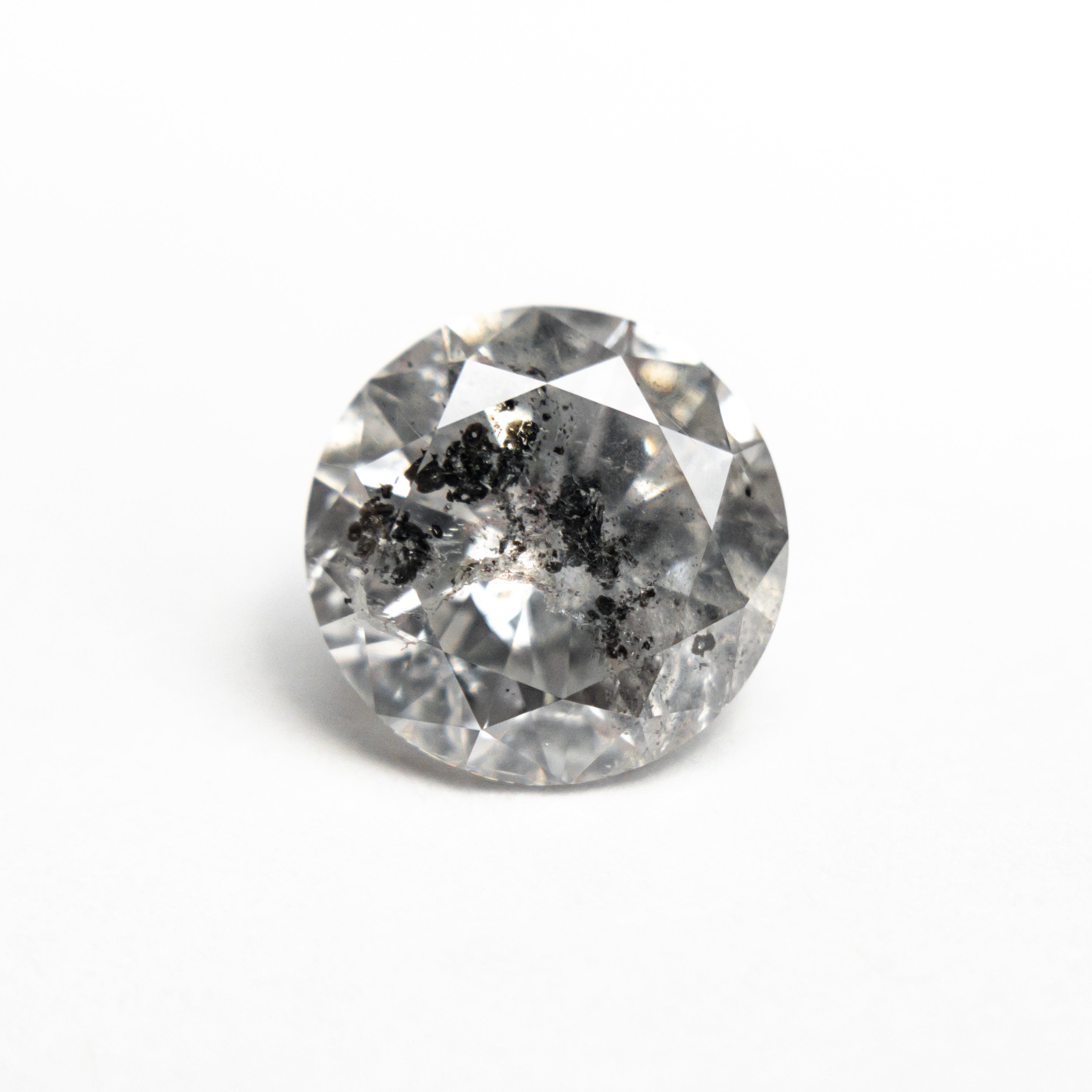 The 2.03ct 8.03x8.00x4.87mm Round Brilliant 21882-02 by East London jeweller Rachel Boston | Discover our collections of unique and timeless engagement rings, wedding rings, and modern fine jewellery.