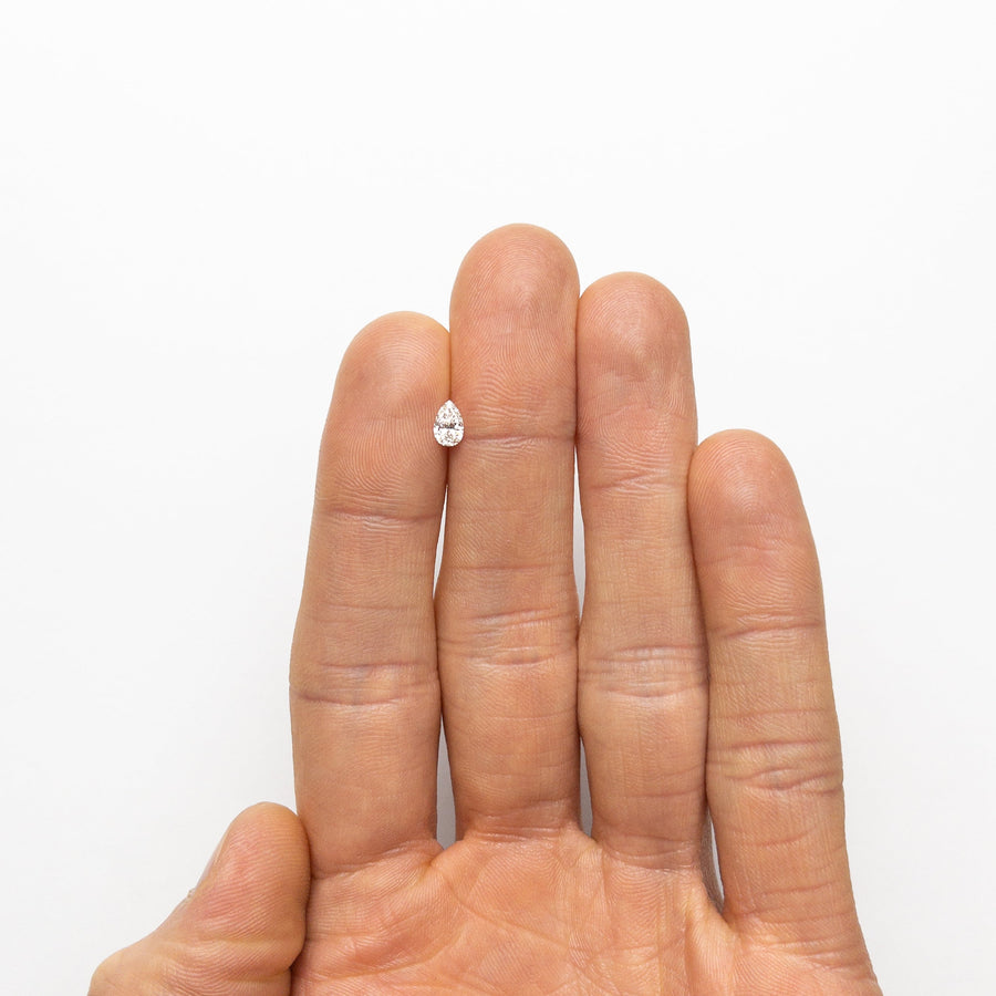 The 0.31ct 5.78x3.75x2.22mm SI1 E Pear Brilliant 🇨🇦 21912-03 by East London jeweller Rachel Boston | Discover our collections of unique and timeless engagement rings, wedding rings, and modern fine jewellery. - Rachel Boston Jewellery