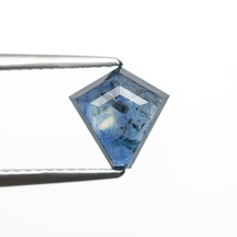 The 1.74ct 8.30x8.21x3.19mm Shield Step Cut Sapphire 22266-25 by East London jeweller Rachel Boston | Discover our collections of unique and timeless engagement rings, wedding rings, and modern fine jewellery. - Rachel Boston Jewellery