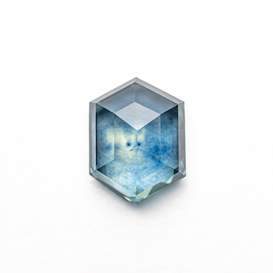 The 1.61ct 7.81x5.93x3.23mm Hexagon Step Cut Sapphire 22266-27 by East London jeweller Rachel Boston | Discover our collections of unique and timeless engagement rings, wedding rings, and modern fine jewellery. - Rachel Boston Jewellery
