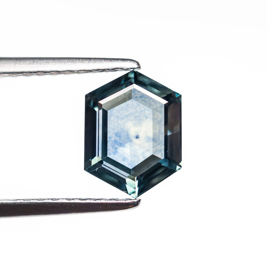 The 1.61ct 7.81x5.93x3.23mm Hexagon Step Cut Sapphire 22266-27 by East London jeweller Rachel Boston | Discover our collections of unique and timeless engagement rings, wedding rings, and modern fine jewellery. - Rachel Boston Jewellery