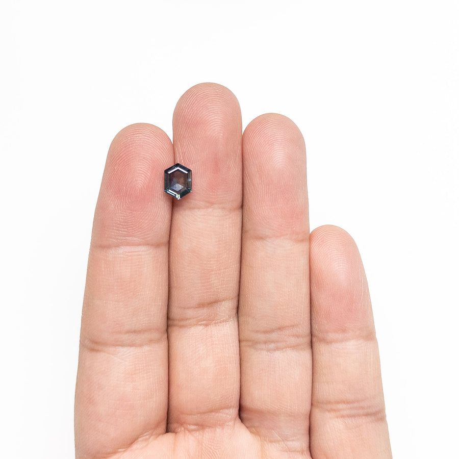 The 1.61ct 7.81x5.93x3.23mm Hexagon Step Cut Sapphire 22266-27 by East London jeweller Rachel Boston | Discover our collections of unique and timeless engagement rings, wedding rings, and modern fine jewellery. - Rachel Boston Jewellery