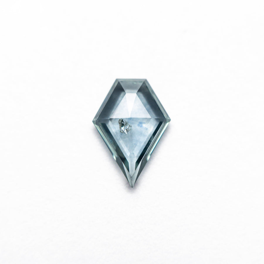 The 0.66ct 7.91x5.59x1.86mm Shield Rosecut Sapphire 22266-32 by East London jeweller Rachel Boston | Discover our collections of unique and timeless engagement rings, wedding rings, and modern fine jewellery. - Rachel Boston Jewellery