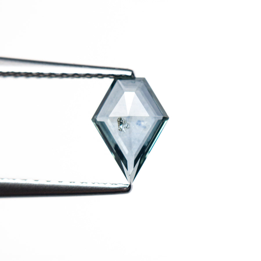 The 0.66ct 7.91x5.59x1.86mm Shield Rosecut Sapphire 22266-32 by East London jeweller Rachel Boston | Discover our collections of unique and timeless engagement rings, wedding rings, and modern fine jewellery. - Rachel Boston Jewellery