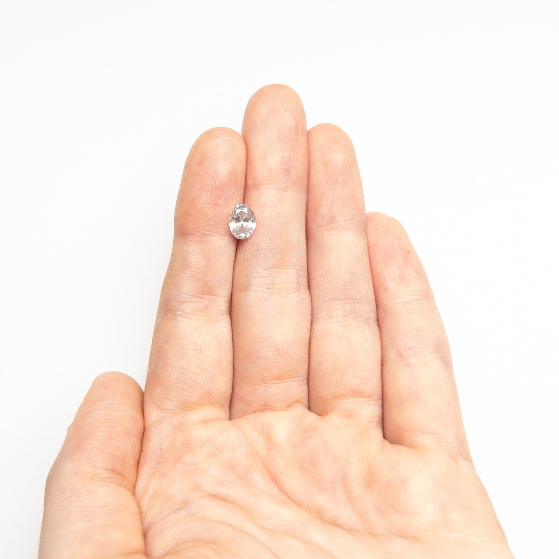 The 0.83ct 7.18x5.45x3.23mm Oval Brilliant 22341-03 by East London jeweller Rachel Boston | Discover our collections of unique and timeless engagement rings, wedding rings, and modern fine jewellery.