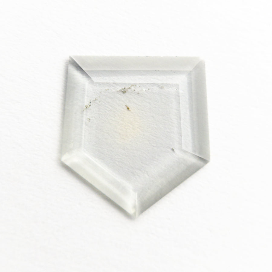 The 1.00ct 9.65x8.90x0.99mm Shield Portrait Cut Sapphire 22392-01 by East London jeweller Rachel Boston | Discover our collections of unique and timeless engagement rings, wedding rings, and modern fine jewellery. - Rachel Boston Jewellery