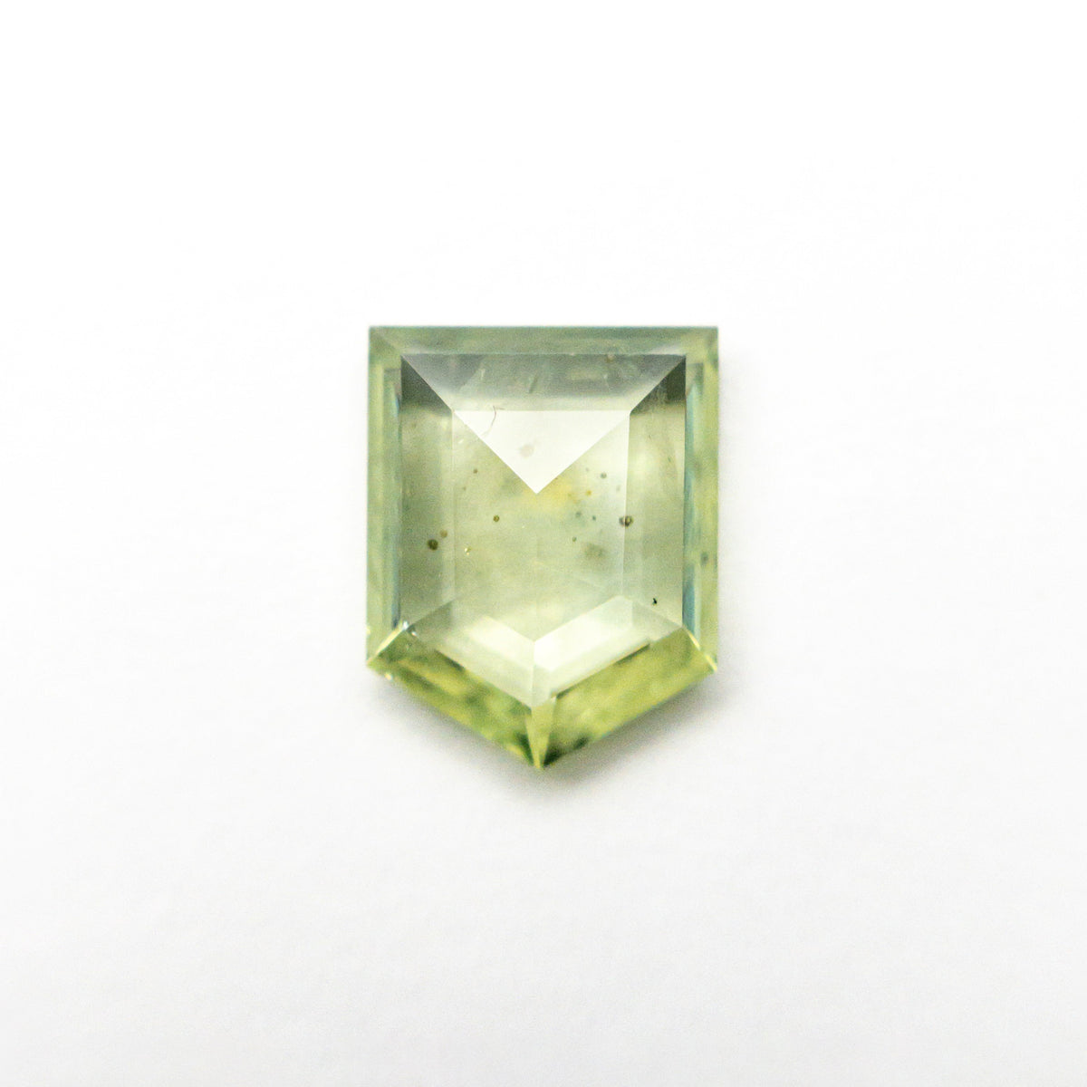 The 1.46ct 8.02x6.41x2.51mm Pentagon Rosecut Sapphire 22434-129 by East London jeweller Rachel Boston | Discover our collections of unique and timeless engagement rings, wedding rings, and modern fine jewellery.