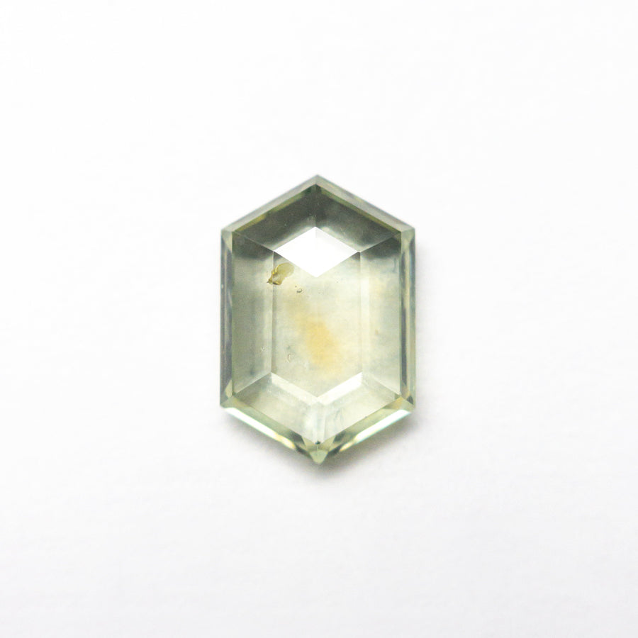 The 1.56ct 8.99x6.07x2.58mm Hexagon Portrait Cut Sapphire 22434-134 by East London jeweller Rachel Boston | Discover our collections of unique and timeless engagement rings, wedding rings, and modern fine jewellery. - Rachel Boston Jewellery