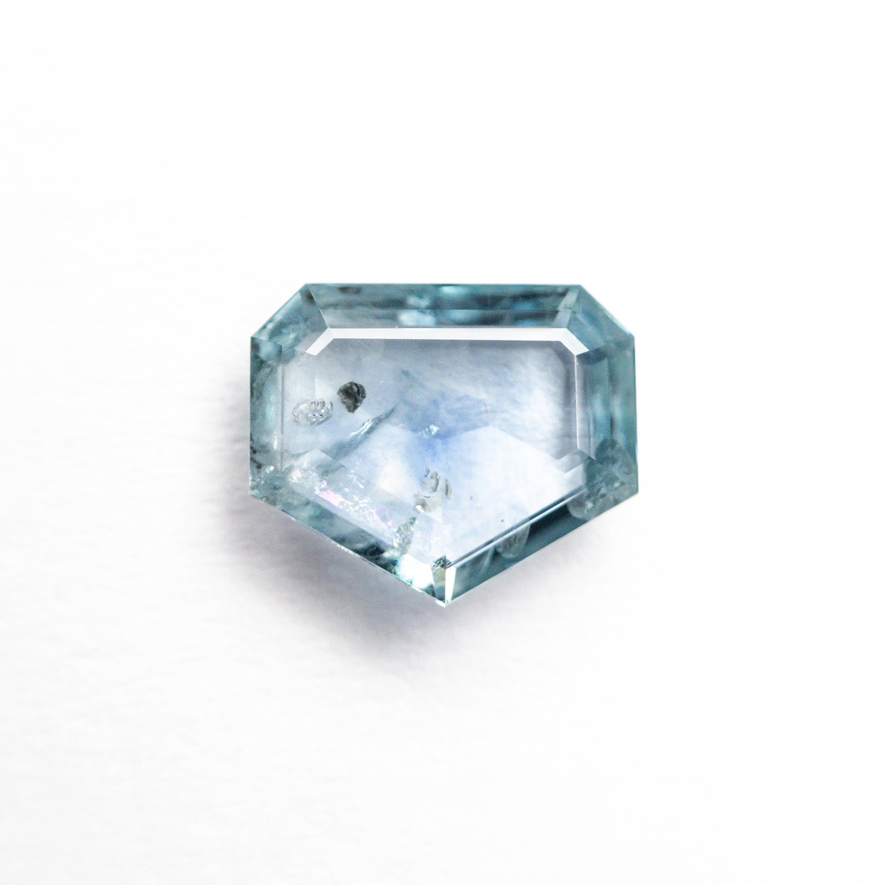 The 1.23ct 7.34x6.15x2.28mm Shield Rosecut Sapphire 22434-62 by East London jeweller Rachel Boston | Discover our collections of unique and timeless engagement rings, wedding rings, and modern fine jewellery.