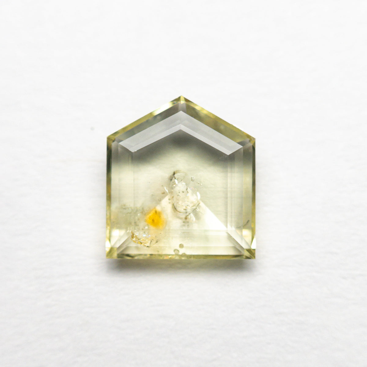 The 1.36ct 7.51x6.69x2.25mm Shield Double Cut Sapphire 22434-75 by East London jeweller Rachel Boston | Discover our collections of unique and timeless engagement rings, wedding rings, and modern fine jewellery.