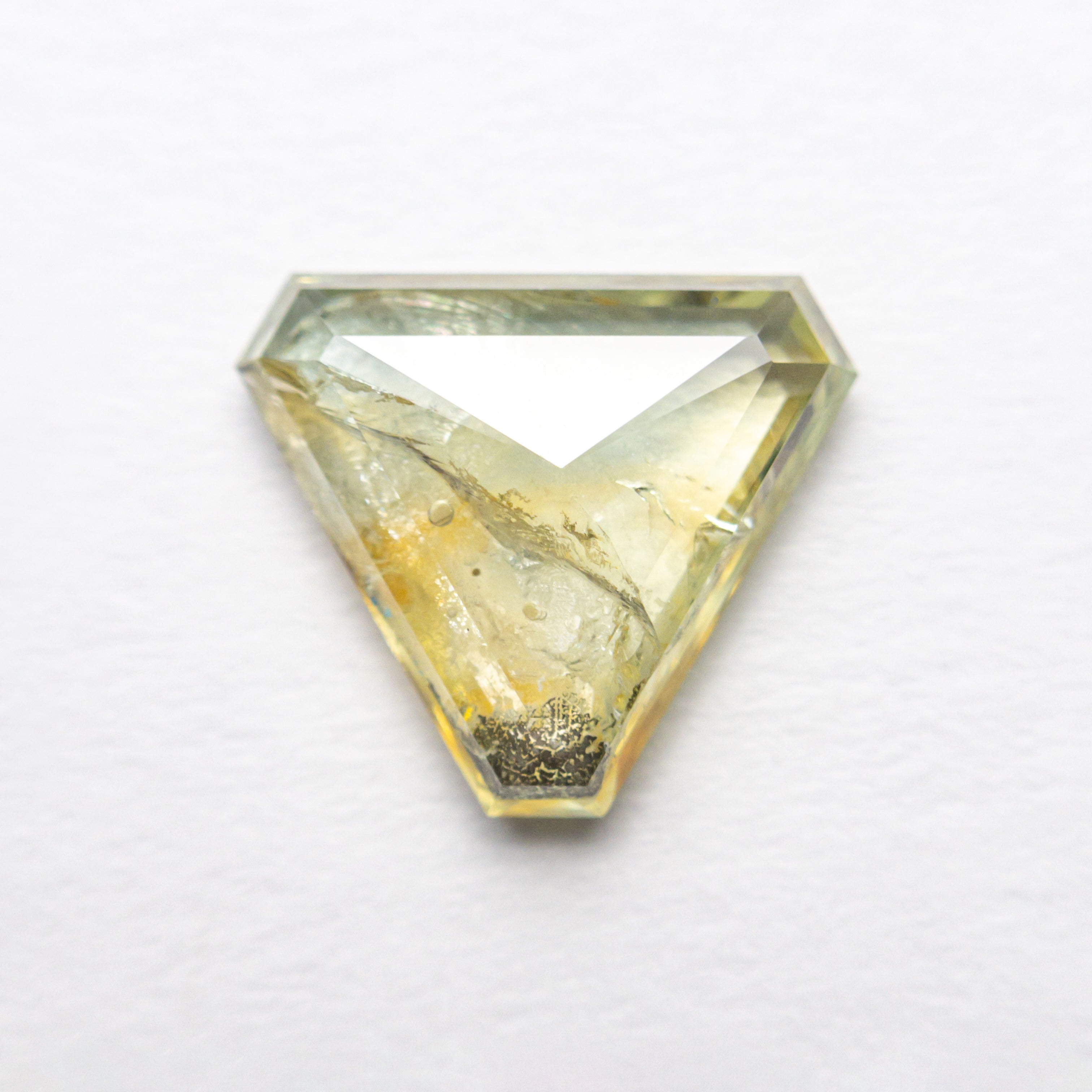 The 1.99ct 8.35x9.64x2.72mm Cut Corner Triangle Rosecut Sapphire 22434-77 by East London jeweller Rachel Boston | Discover our collections of unique and timeless engagement rings, wedding rings, and modern fine jewellery.