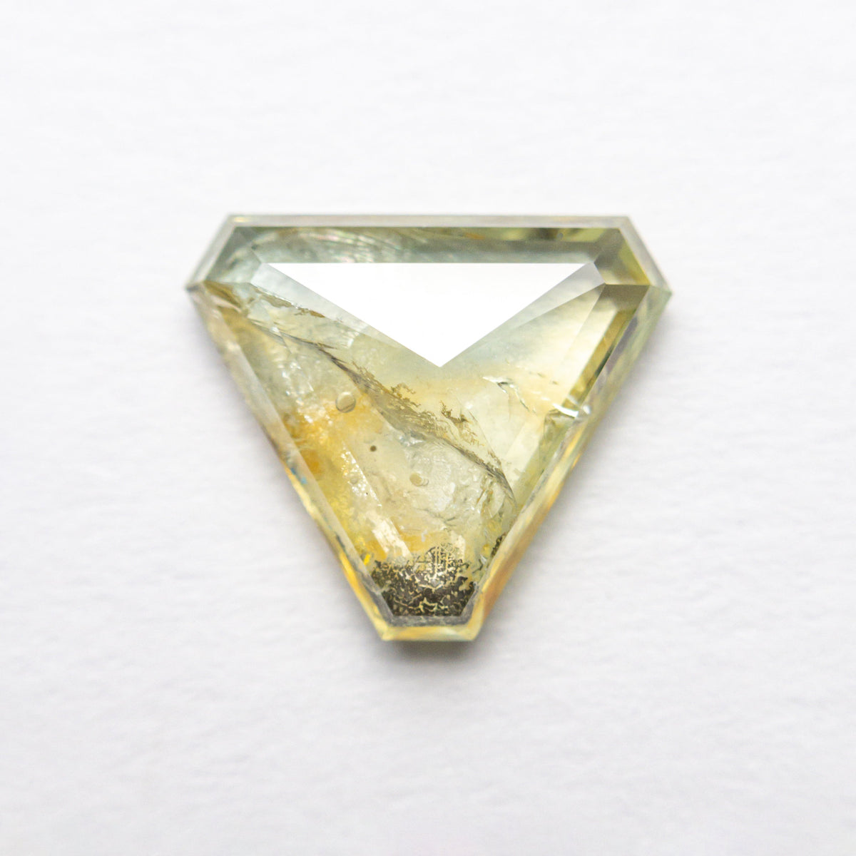 The 1.99ct 8.35x9.64x2.72mm Cut Corner Triangle Rosecut Sapphire 22434-77 by East London jeweller Rachel Boston | Discover our collections of unique and timeless engagement rings, wedding rings, and modern fine jewellery.